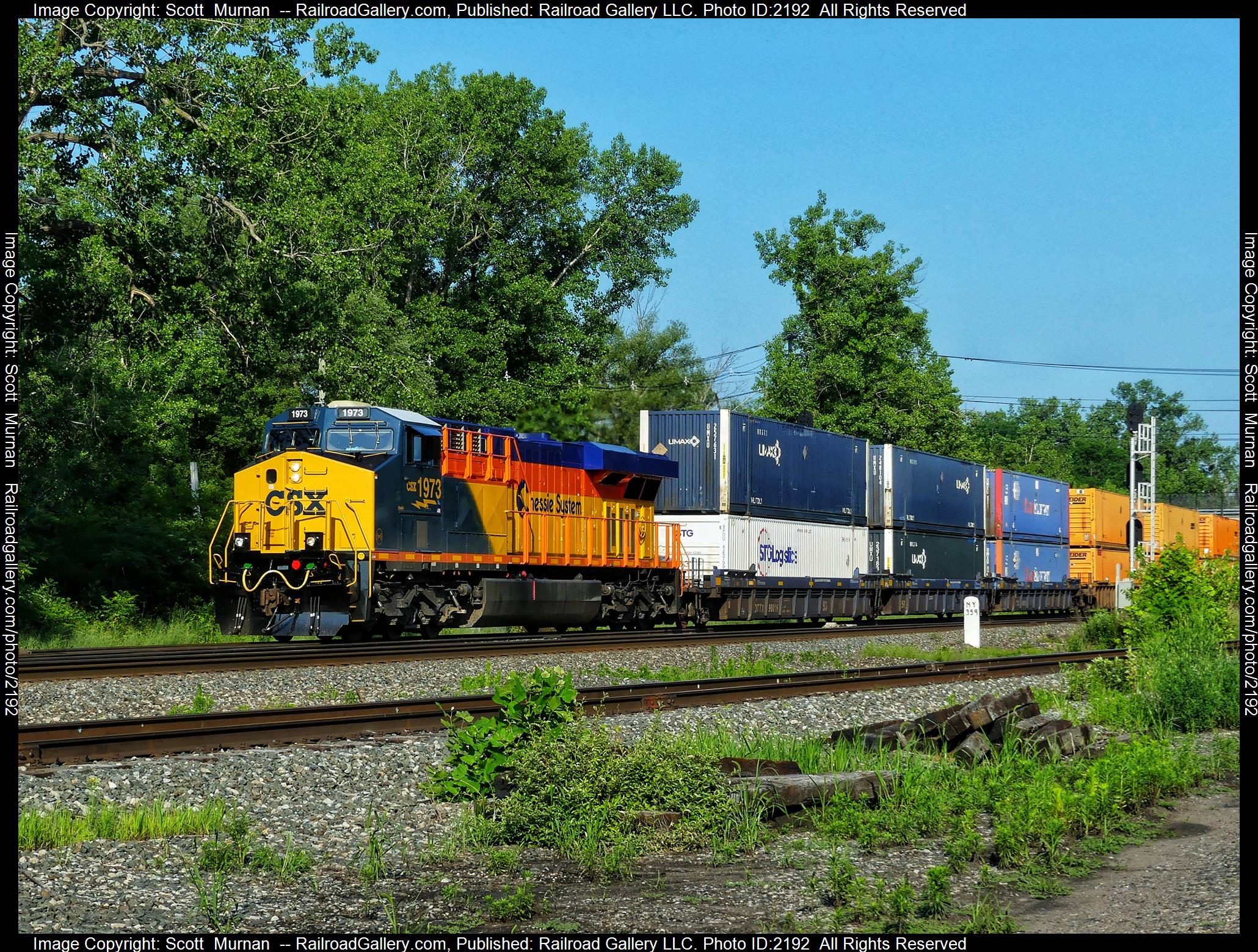 CSX 1973 is a class GE ES44AC and  is pictured in Perinton , New York, United States.  This was taken along the Rochester Subdivision  on the CSX Transportation. Photo Copyright: Scott  Murnan  uploaded to Railroad Gallery on 07/04/2023. This photograph of CSX 1973 was taken on Tuesday, July 04, 2023. All Rights Reserved. 