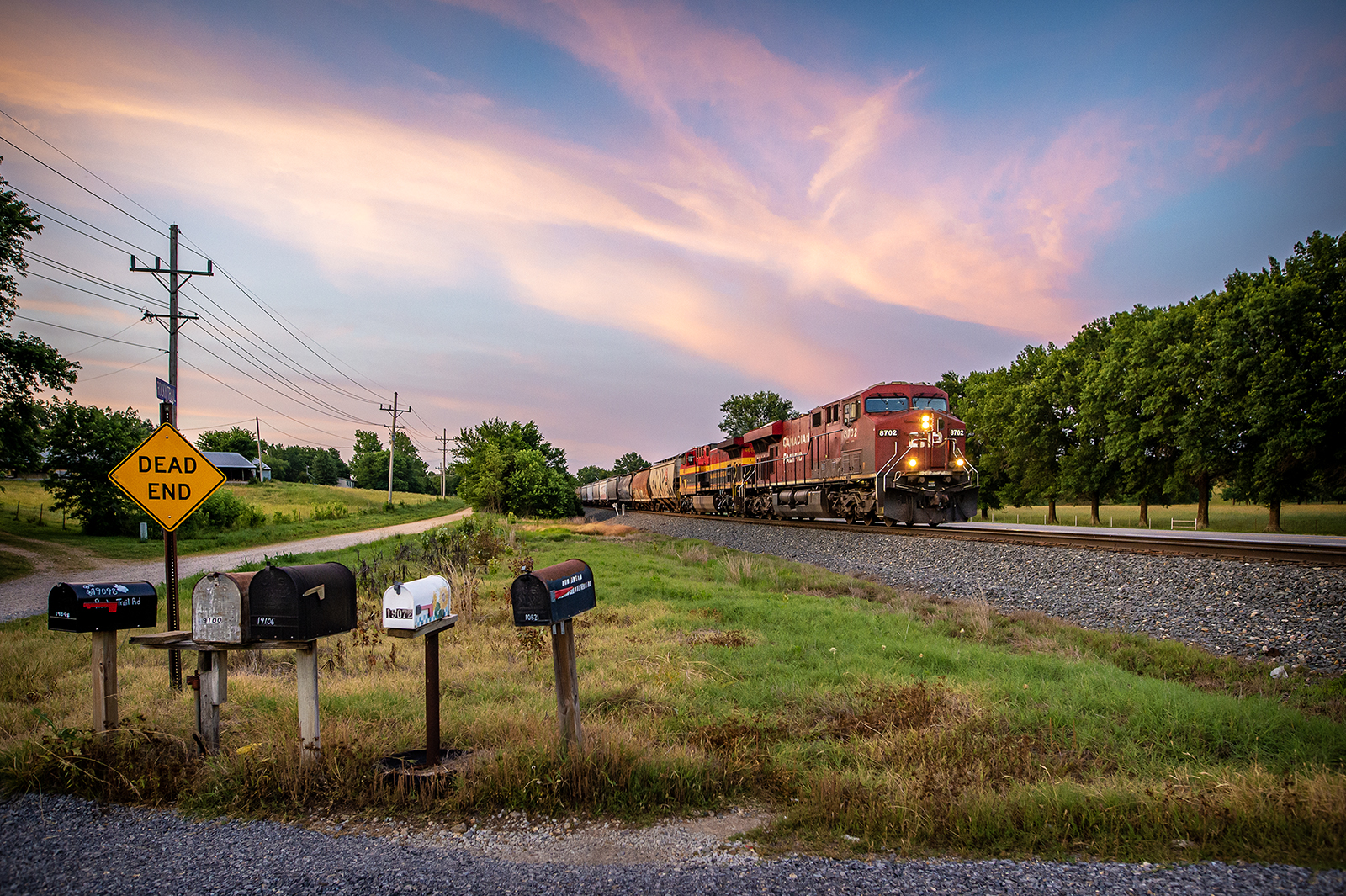 CP 8702 is a class GE ES44AC and  is pictured in Gentry, Arkansas, USA.  This was taken along the Heavener Subdivision on the CPKC Railway. Photo Copyright: Hunter Williams uploaded to Railroad Gallery on 07/06/2023. This photograph of CP 8702 was taken on Wednesday, June 07, 2023. All Rights Reserved. 