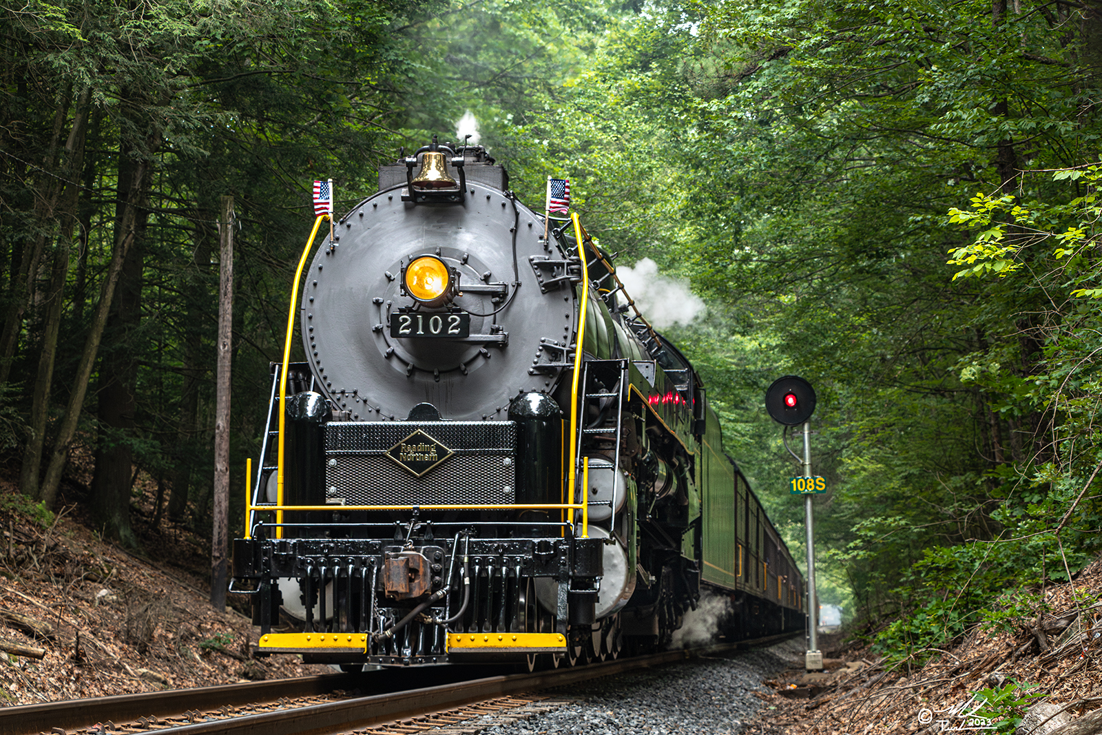 RDG 2102 is a class T-1 and  is pictured in Hometown, Pennsylvania, USA.  This was taken along the Milepost 108 on the Reading Company. Photo Copyright: Mark Turkovich uploaded to Railroad Gallery on 07/07/2023. This photograph of RDG 2102 was taken on Saturday, July 01, 2023. All Rights Reserved. 