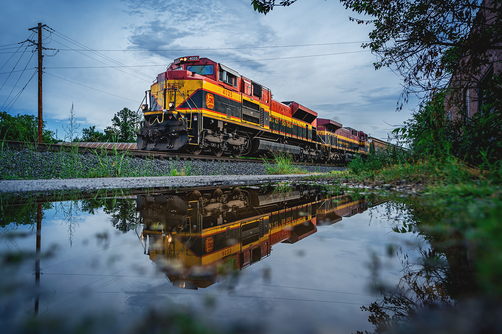 KCS 4025 is a class EMD SD70ACe and  is pictured in Noel, Missouri, USA.  This was taken along the CPKC Heavener Subdivision on the CPKC Railway. Photo Copyright: Hunter Williams uploaded to Railroad Gallery on 07/08/2023. This photograph of KCS 4025 was taken on Saturday, July 08, 2023. All Rights Reserved. 