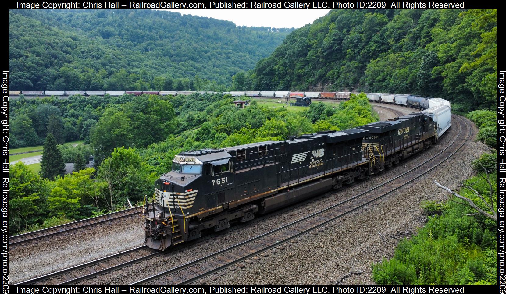 NS 7561 is a class GE ES40DC and  is pictured in Altoona, Pennsylvania, United States.  This was taken along the Pittsburgh Line on the Norfolk Southern. Photo Copyright: Chris Hall uploaded to Railroad Gallery on 07/09/2023. This photograph of NS 7561 was taken on Friday, July 07, 2023. All Rights Reserved. 