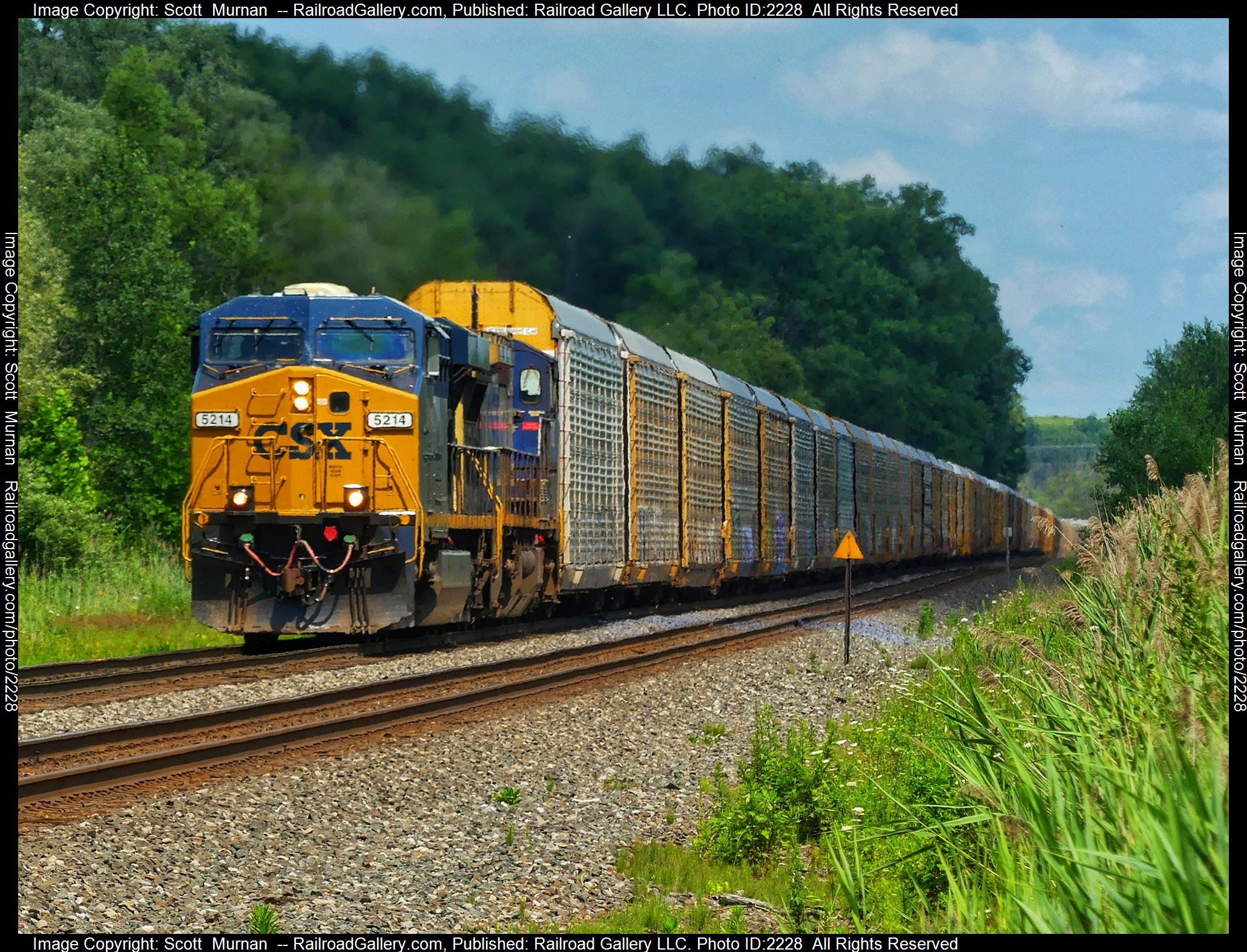 CSX 5214 is a class GE ES40DC and  is pictured in Wayneport , New York, United States.  This was taken along the Rochester Subdivision  on the CSX Transportation. Photo Copyright: Scott  Murnan  uploaded to Railroad Gallery on 07/19/2023. This photograph of CSX 5214 was taken on Wednesday, July 19, 2023. All Rights Reserved. 