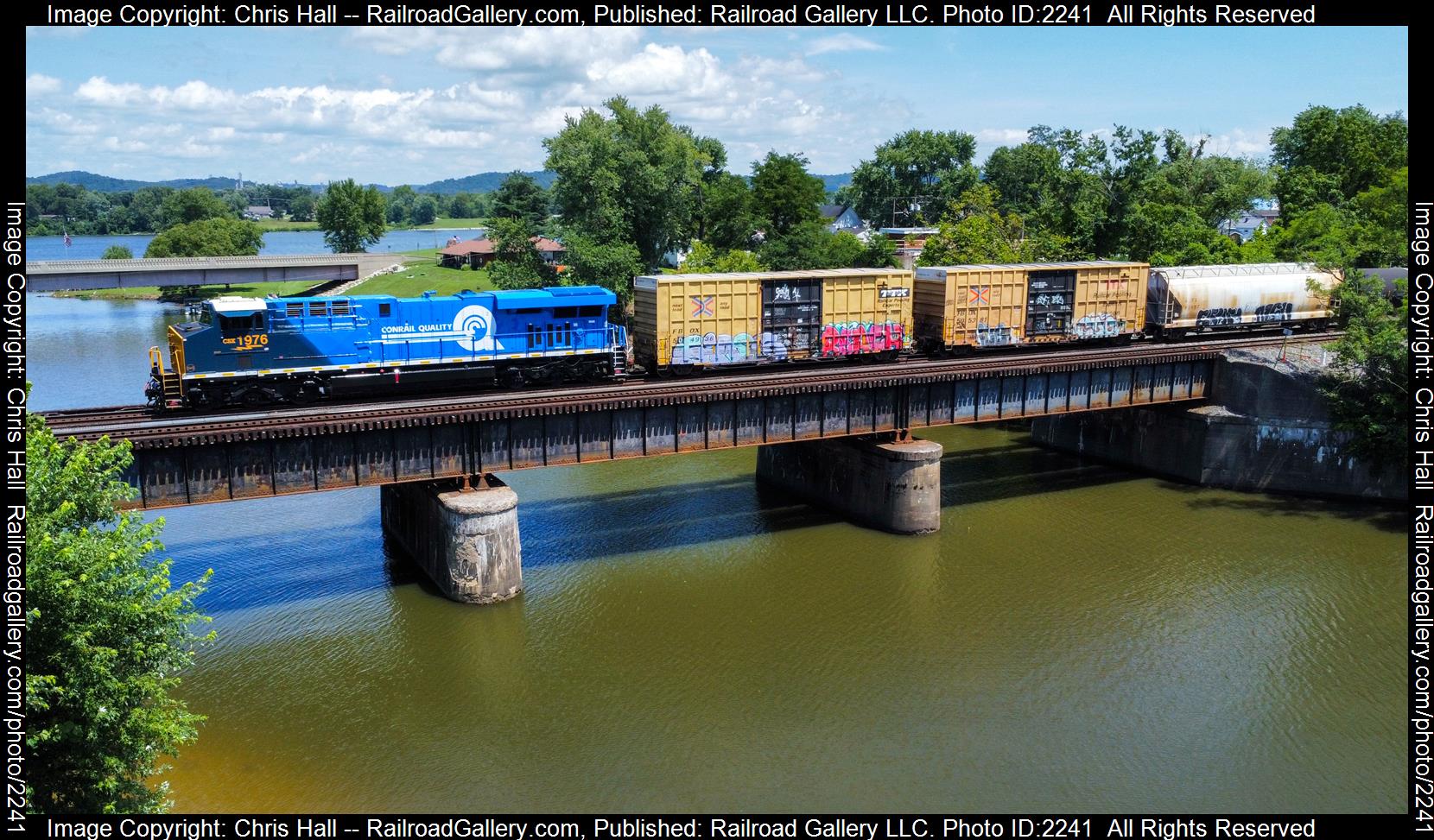 CSXT 1976 is a class GE ES44AC and  is pictured in Greenup, Kentucky, United States.  This was taken along the Russell Terminal Subdivision  on the CSX Transportation. Photo Copyright: Chris Hall uploaded to Railroad Gallery on 07/31/2023. This photograph of CSXT 1976 was taken on Saturday, July 29, 2023. All Rights Reserved. 