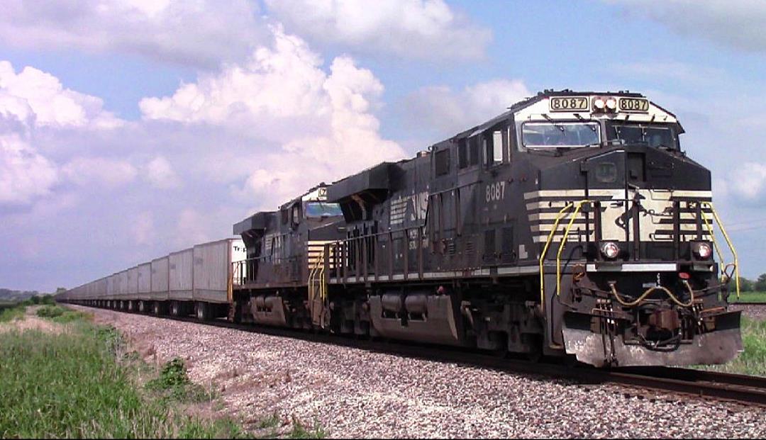 NS 8087 is a class GE ES44AC and  is pictured in Norborne, Missouri, USA.  This was taken along the BNSF Marceline subdivision on the Norfolk Southern. Photo Copyright: Blaise Lambert uploaded to Railroad Gallery on 07/31/2023. This photograph of NS 8087 was taken on Saturday, July 01, 2023. All Rights Reserved. 