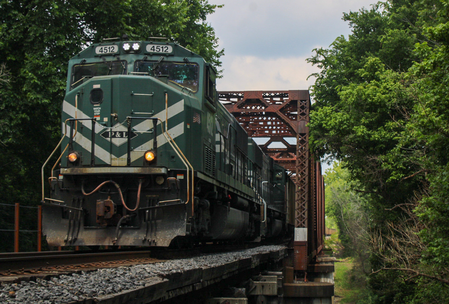 PAL 4512 is a class EMD SD70MAC and  is pictured in West Point, Kentucky, United States.  This was taken along the Horse Branch Sub on the Paducah & Louisville . Photo Copyright: Chris Hall uploaded to Railroad Gallery on 08/03/2023. This photograph of PAL 4512 was taken on Tuesday, June 27, 2023. All Rights Reserved. 