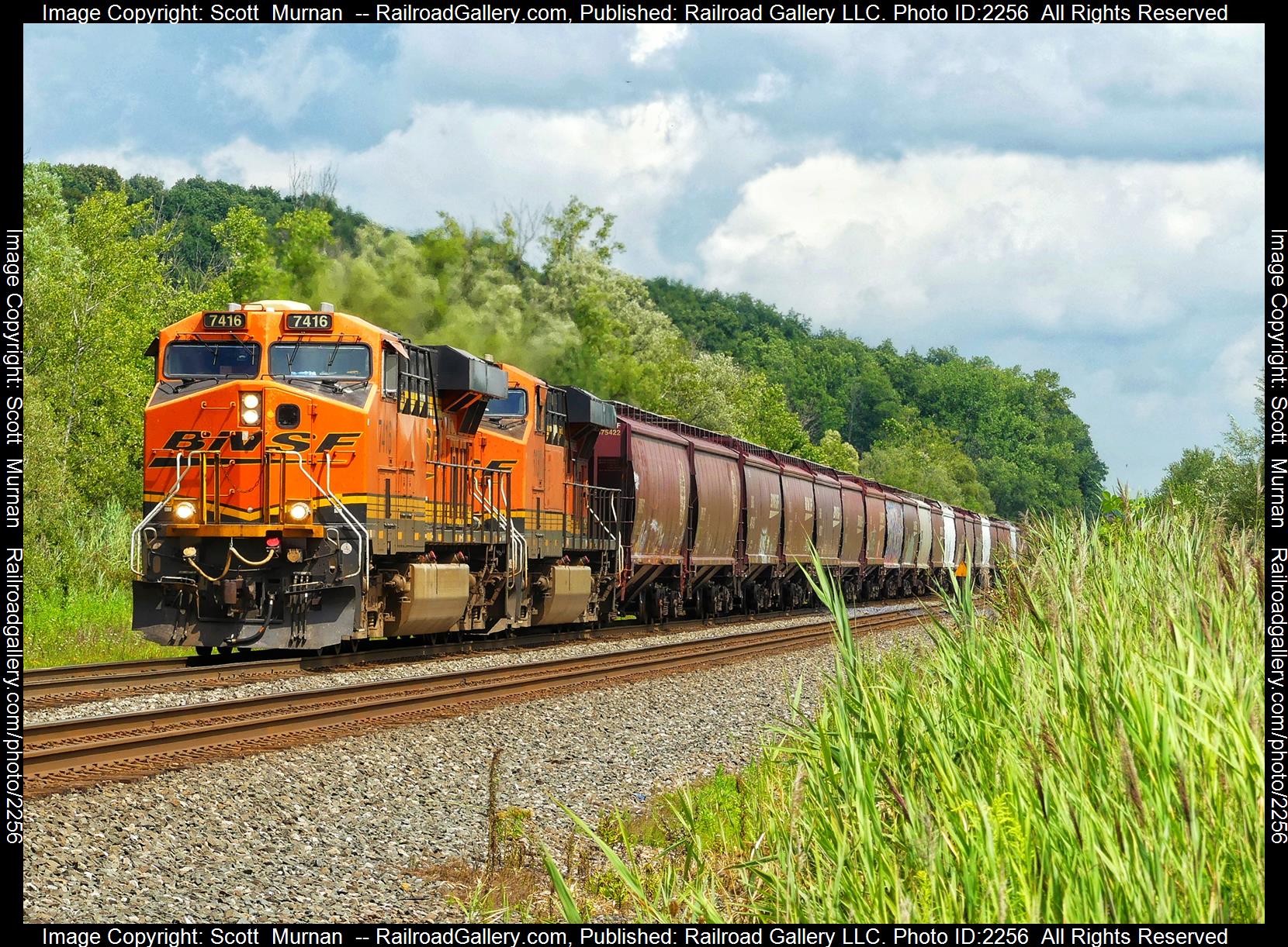 BNSF 7416 is a class GE ES44DC and  is pictured in Wayneport , New York, United States.  This was taken along the Rochester Subdivision  on the CSX Transportation. Photo Copyright: Scott  Murnan  uploaded to Railroad Gallery on 08/10/2023. This photograph of BNSF 7416 was taken on Thursday, August 10, 2023. All Rights Reserved. 