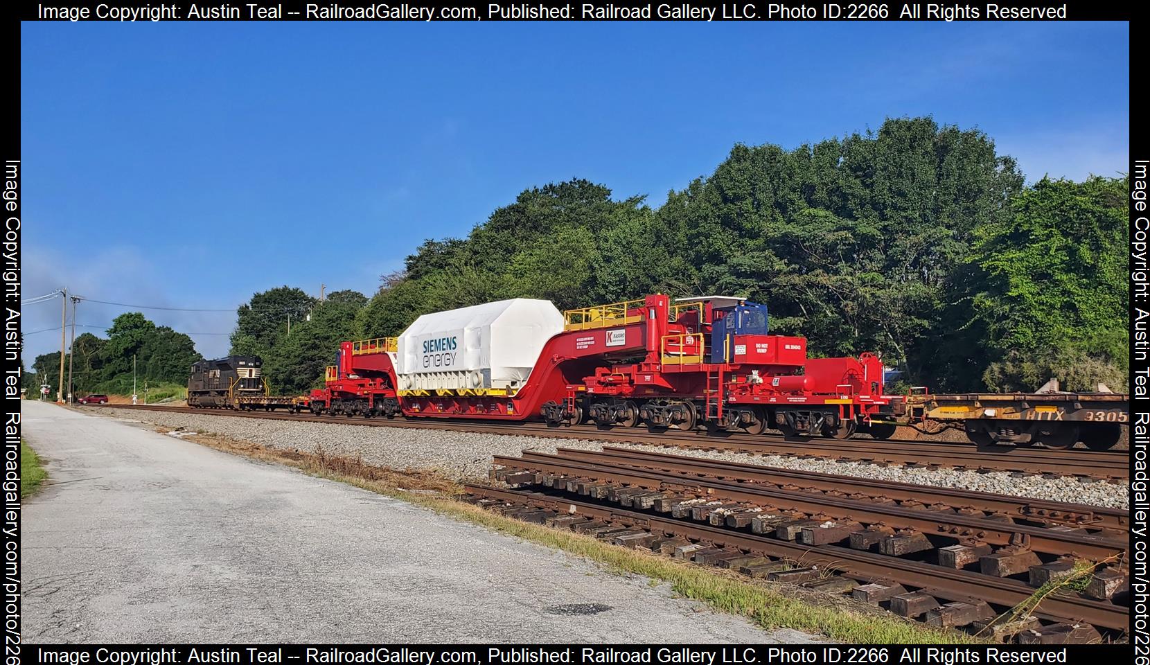 NS 1165 is a class EMD SD70ACe and  is pictured in Greenville, South Carolina, United States.  This was taken along the Norfolk Southern Greenville to Linwood on the Norfolk Southern. Photo Copyright: Austin Teal uploaded to Railroad Gallery on 08/11/2023. This photograph of NS 1165 was taken on Tuesday, August 08, 2023. All Rights Reserved. 