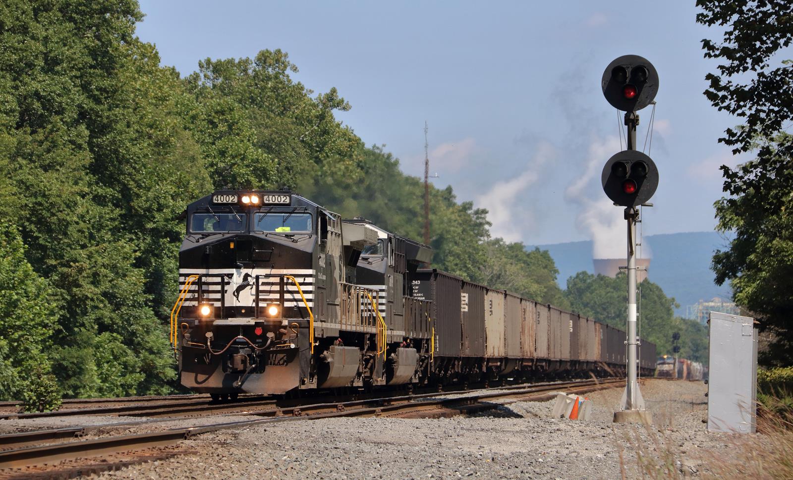 NS 4002 is a class GE AC44C6M and  is pictured in New Florence, Pennsylvania, USA.  This was taken along the NS Pittsburgh Line on the Norfolk Southern. Photo Copyright: Marc Lingenfelter uploaded to Railroad Gallery on 11/24/2022. This photograph of NS 4002 was taken on Sunday, August 20, 2017. All Rights Reserved. 