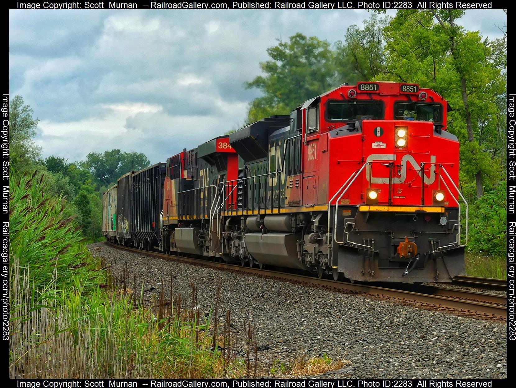 CN 8851 is a class EMD SD70M-2 and  is pictured in Wayneport , New York, United States.  This was taken along the Rochester Subdivision  on the CSX Transportation. Photo Copyright: Scott  Murnan  uploaded to Railroad Gallery on 08/16/2023. This photograph of CN 8851 was taken on Tuesday, August 15, 2023. All Rights Reserved. 