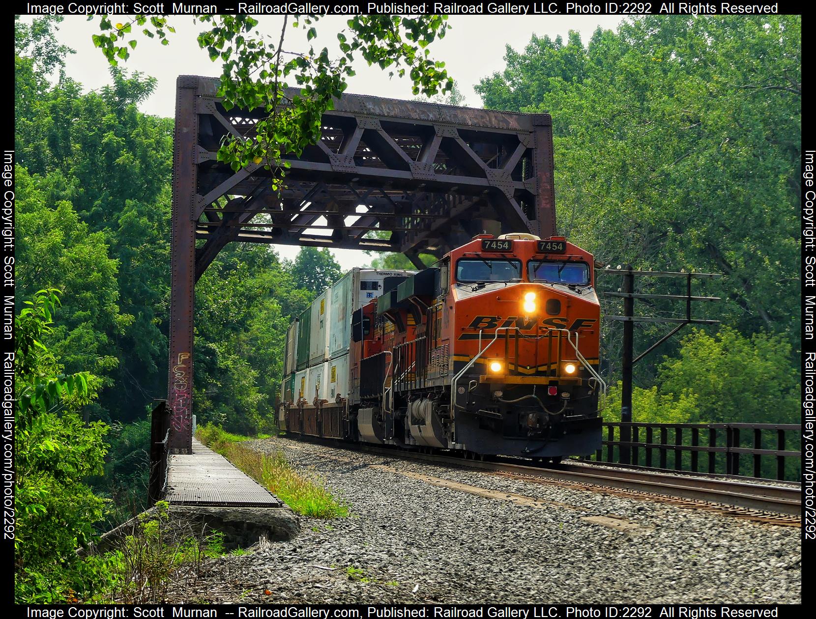 BNSF 7454 is a class GE ES44DC and  is pictured in Irving, New York, United States.  This was taken along the Lake Erie District  on the Norfolk Southern. Photo Copyright: Scott  Murnan  uploaded to Railroad Gallery on 08/23/2023. This photograph of BNSF 7454 was taken on Monday, August 21, 2023. All Rights Reserved. 