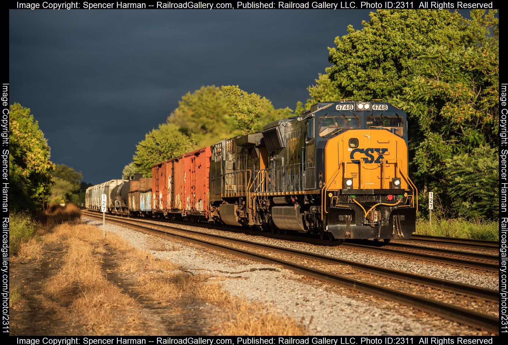 CSXT 4748 is a class EMD SD70MAC and  is pictured in Garrett, Indiana, USA.  This was taken along the Garrett Subdivision on the CSX Transportation. Photo Copyright: Spencer Harman uploaded to Railroad Gallery on 09/08/2023. This photograph of CSXT 4748 was taken on Thursday, September 07, 2023. All Rights Reserved. 