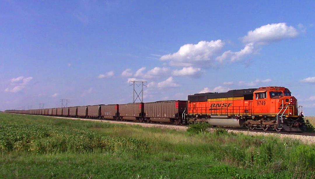 BNSF 9749 is a class EMD SD70MAC and  is pictured in Newton, Illinois, USA.  This was taken along the CN Effingham subdivision on the BNSF Railway. Photo Copyright: Blaise Lambert uploaded to Railroad Gallery on 09/11/2023. This photograph of BNSF 9749 was taken on Monday, September 04, 2023. All Rights Reserved. 