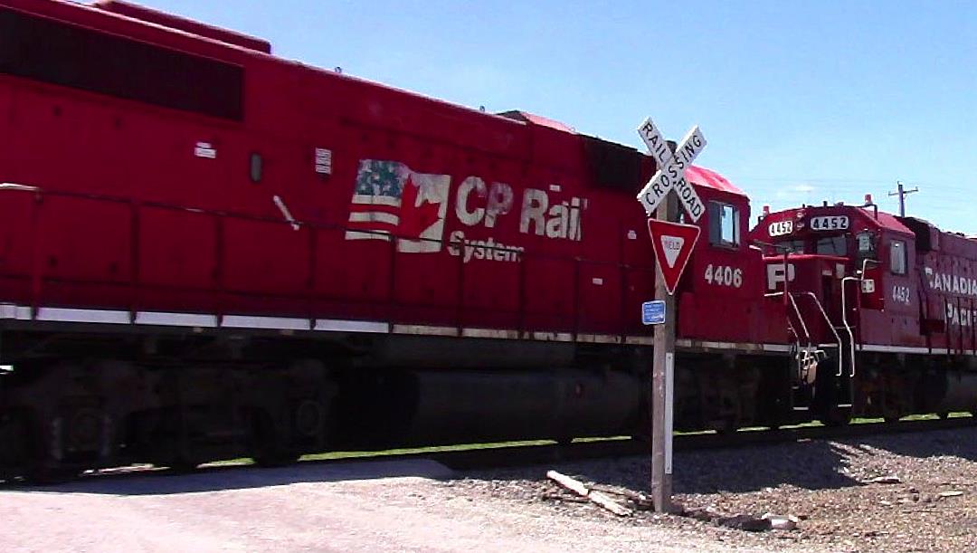 CP 4406 is a class EMD GP38-2 and  is pictured in Cravat, Illinois, USA.  This was taken along the BNSF Beardstown subdivision on the Canadian Pacific Railway. Photo Copyright: Blaise Lambert uploaded to Railroad Gallery on 09/11/2023. This photograph of CP 4406 was taken on Thursday, June 23, 2022. All Rights Reserved. 