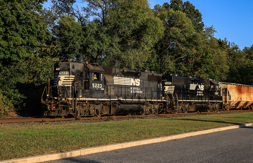 NS 5223 is a class EMD GP38-2 and  is pictured in Glassboro , New Jersey, USA.  This was taken along the Vineland Secondary  on the Conrail Shared Assets . Photo Copyright: Edan  Davis  uploaded to Railroad Gallery on 10/05/2023. This photograph of NS 5223 was taken on Wednesday, October 04, 2023. All Rights Reserved. 