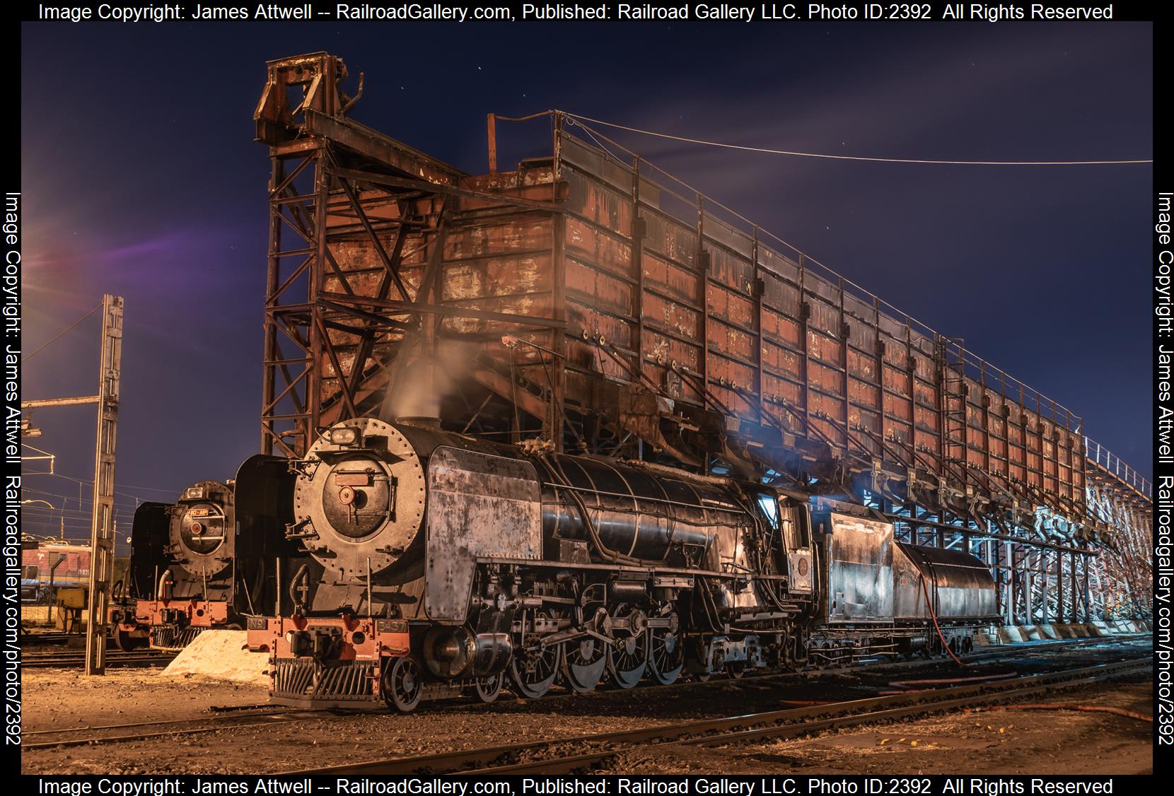 3437 is a class South African Railways class 25NC and  is pictured in Kimberley, Northern Cape, South Africa.  This was taken along the Beaconsfield Depot on the South African Railways. Photo Copyright: James Attwell uploaded to Railroad Gallery on 10/19/2023. This photograph of 3437 was taken on Sunday, June 25, 2023. All Rights Reserved. 