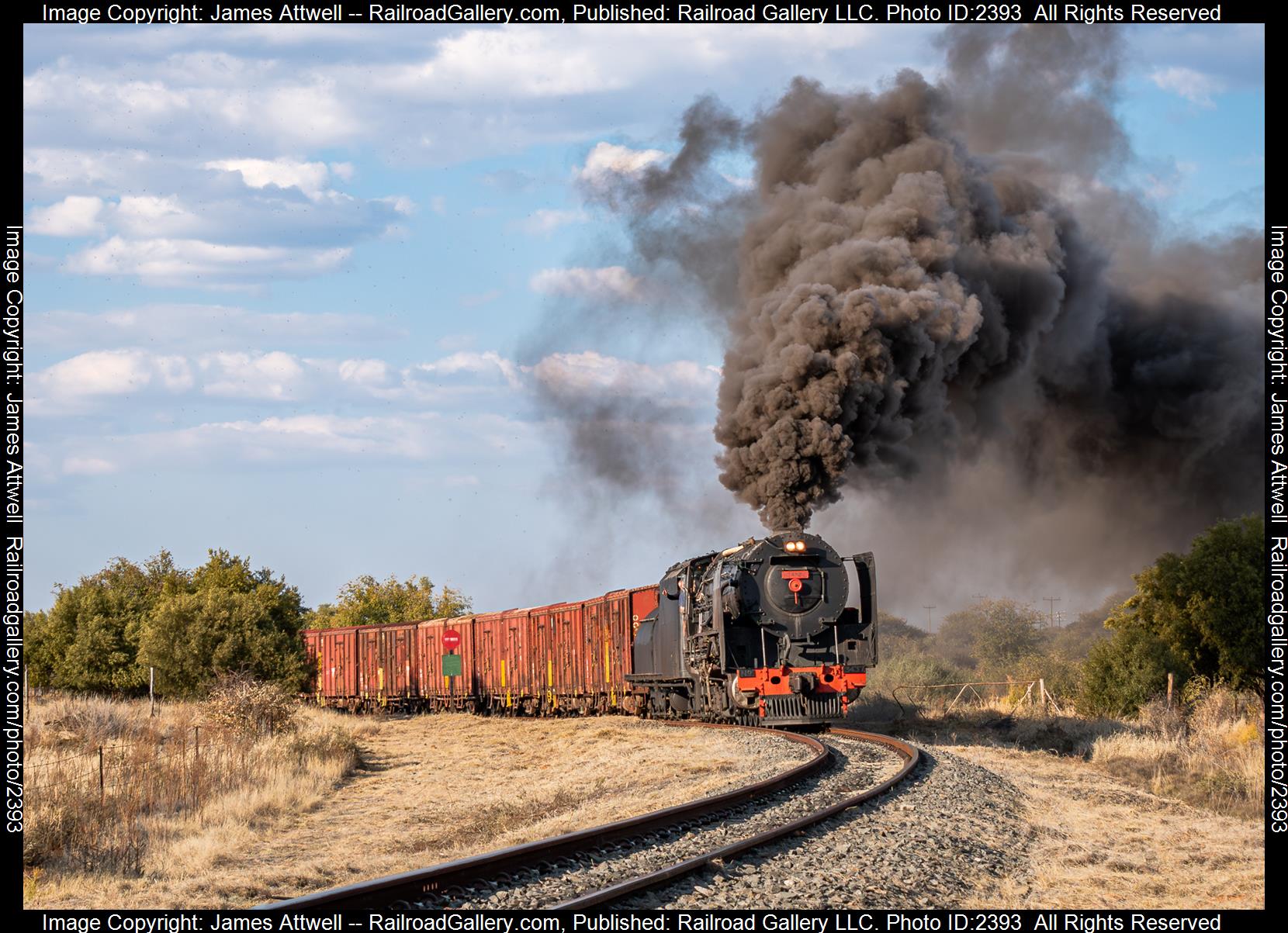 3437 is a class South African Railways class 25NC and  is pictured in Douglas, Northern Cape, South Africa.  This was taken along the Douglas Branchline on the South African Railways. Photo Copyright: James Attwell uploaded to Railroad Gallery on 10/19/2023. This photograph of 3437 was taken on Monday, June 26, 2023. All Rights Reserved. 