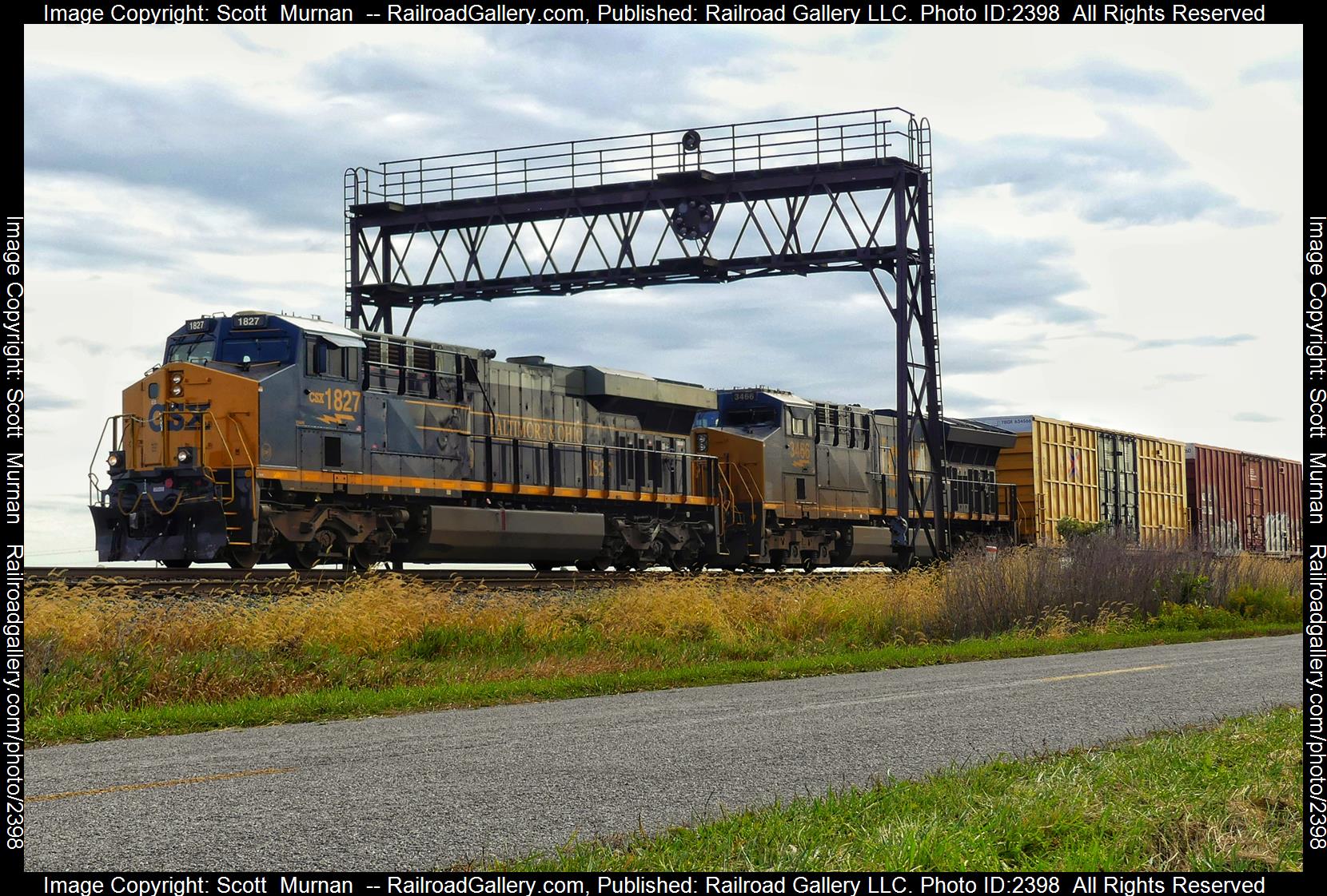 CSX 1827 is a class GE ES44AC and  is pictured in Deshler , Ohio, United States.  This was taken along the Toledo Subdivision  on the CSX Transportation. Photo Copyright: Scott  Murnan  uploaded to Railroad Gallery on 10/21/2023. This photograph of CSX 1827 was taken on Friday, October 13, 2023. All Rights Reserved. 