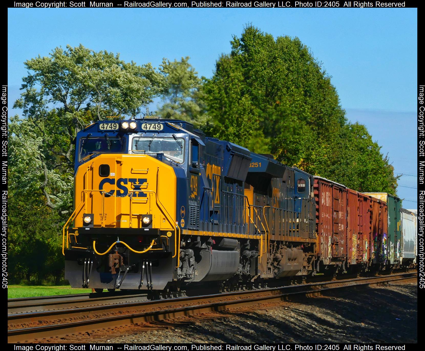 CSX 4749 is a class EMD SD70MAC and  is pictured in Olmsted Falls , Ohio, United States.  This was taken along the Cleveland Sub on the CSX Transportation. Photo Copyright: Scott  Murnan  uploaded to Railroad Gallery on 10/26/2023. This photograph of CSX 4749 was taken on Wednesday, October 11, 2023. All Rights Reserved. 