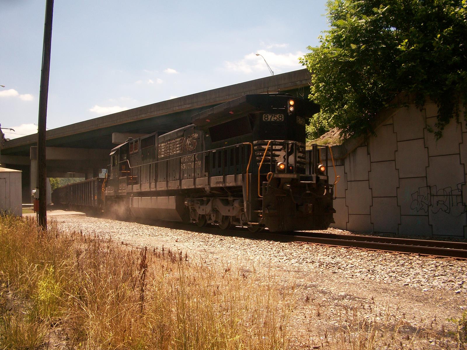 NS 8758 is a class C40-8 and  is pictured in Malden, West Virginia, United States.  This was taken along the West Virginia Secondary on the Norfolk Southern. Photo Copyright: Dennis Shafer uploaded to Railroad Gallery on 11/25/2022. This photograph of NS 8758 was taken on Tuesday, June 08, 2010. All Rights Reserved. 