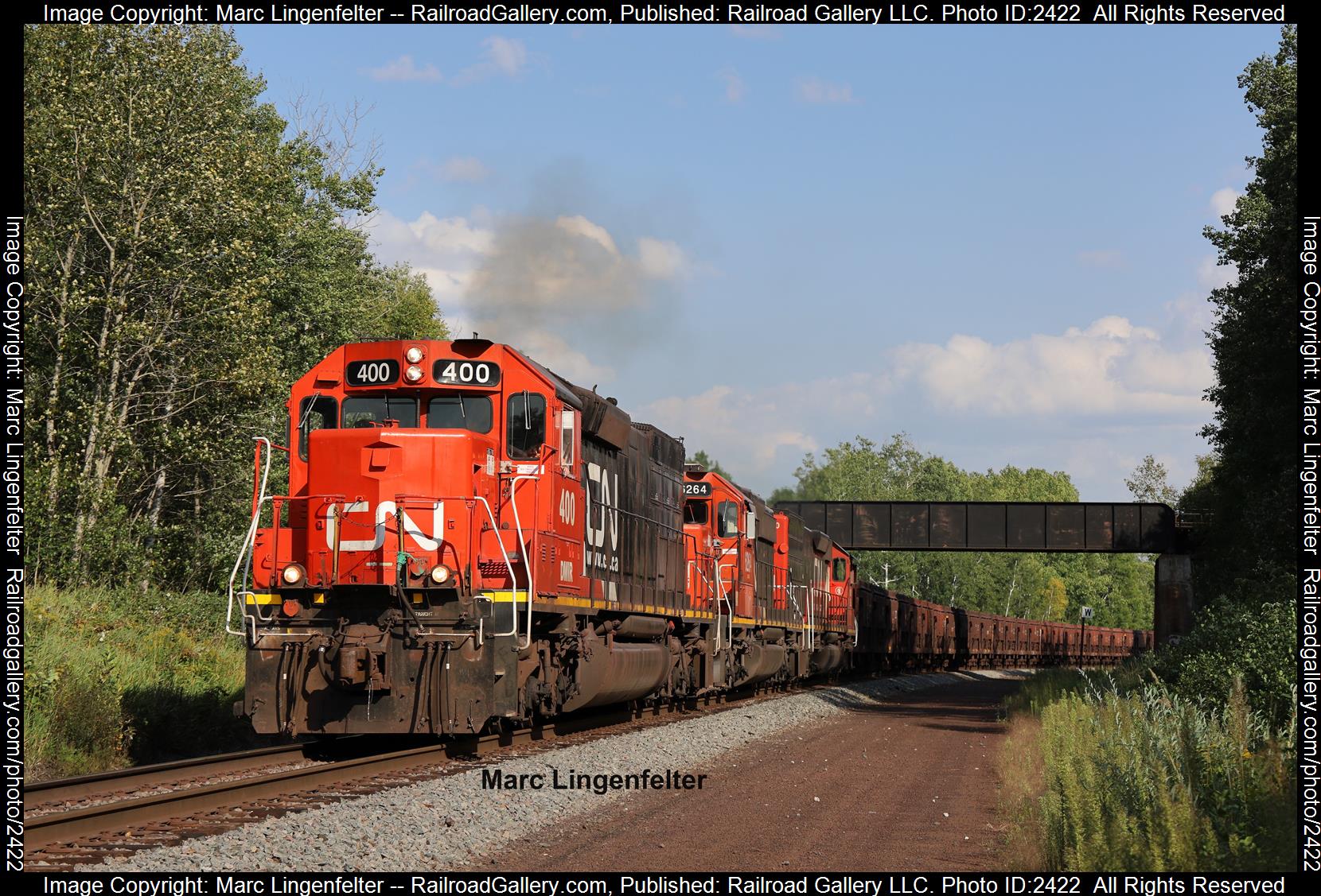 DMIR 400 is a class EMD SD40-3 and  is pictured in Munger, Minnesota, USA.  This was taken along the CN Missabe Sub on the Canadian National Railway. Photo Copyright: Marc Lingenfelter uploaded to Railroad Gallery on 11/08/2023. This photograph of DMIR 400 was taken on Friday, September 15, 2023. All Rights Reserved. 