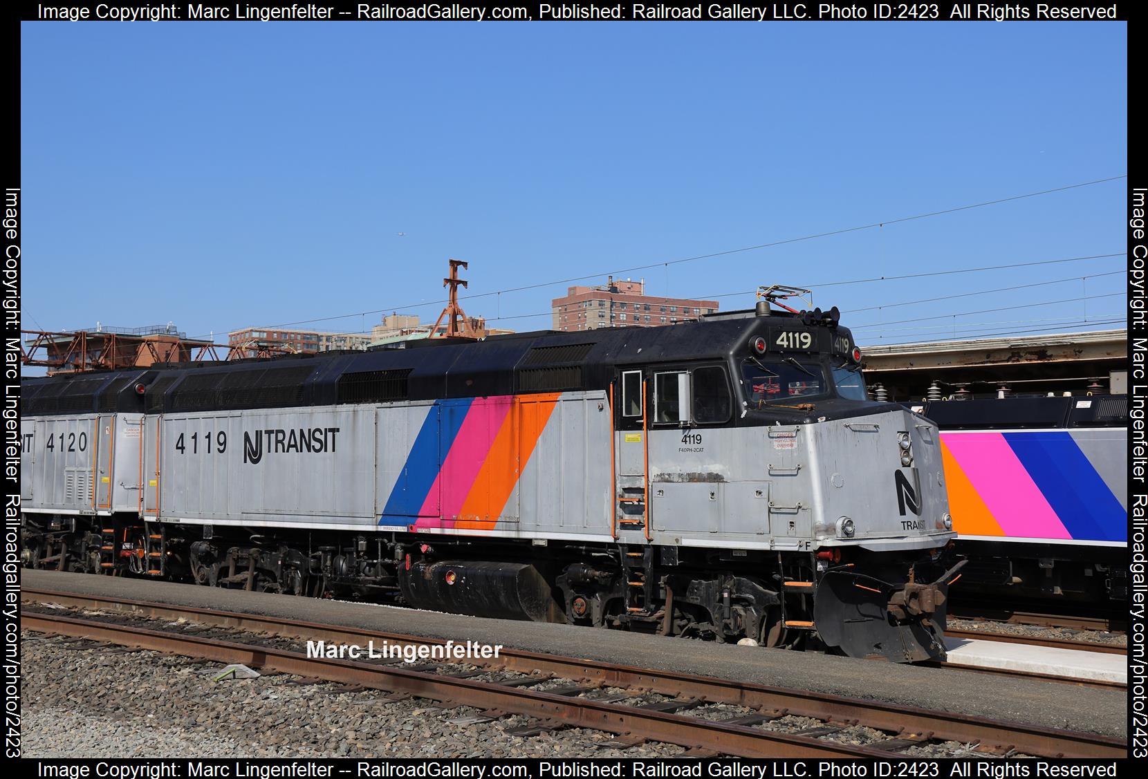 NJT 4119 is a class EMD F40PH and  is pictured in Hoboken, New Jersey, USA.  This was taken along the NJT Hoboken Terminal on the New Jersey Terminal. Photo Copyright: Marc Lingenfelter uploaded to Railroad Gallery on 11/08/2023. This photograph of NJT 4119 was taken on Sunday, October 01, 2023. All Rights Reserved. 