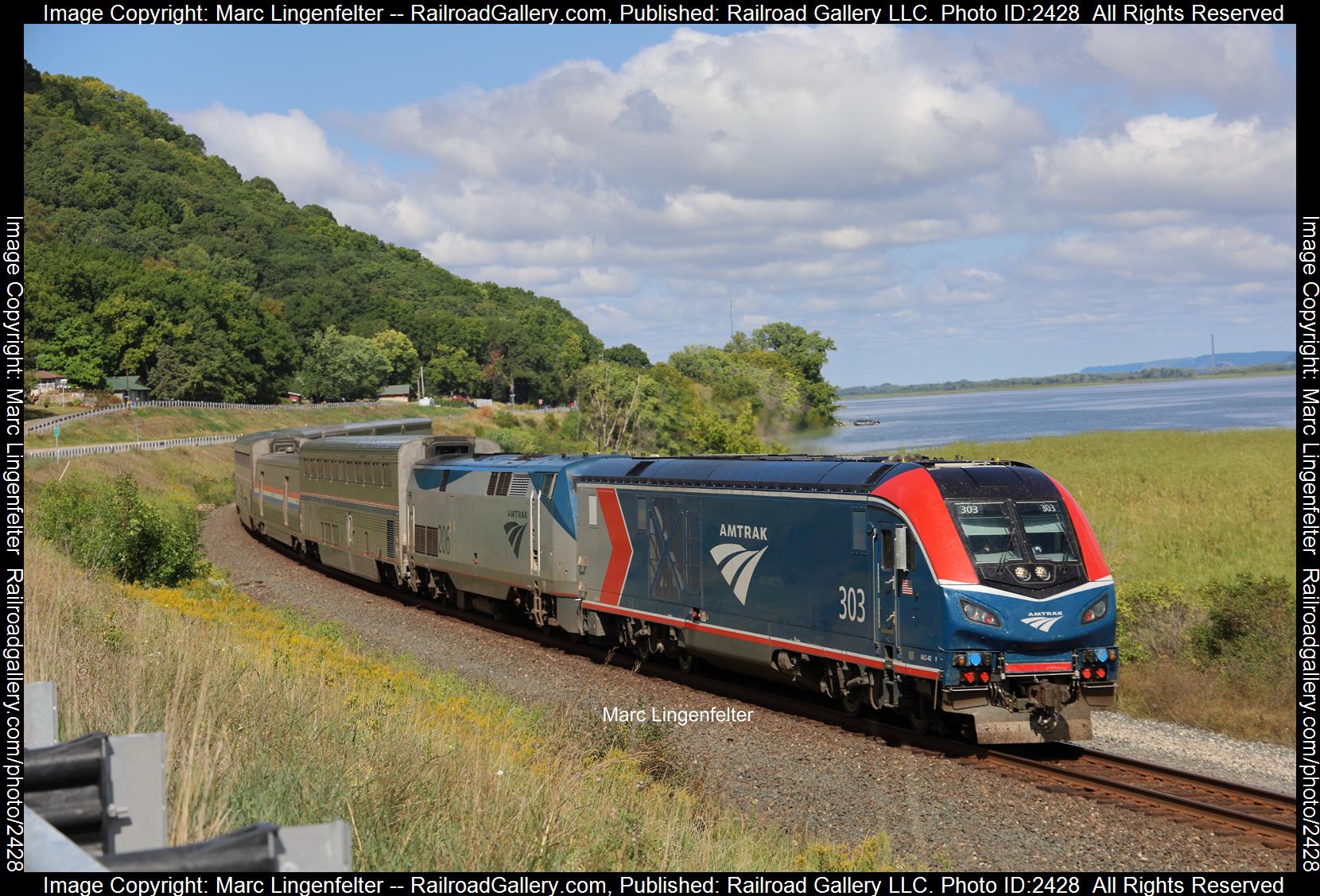 AMTK 303 is a class Siemens ACS-64 and  is pictured in Minneska, Minnesota, USA.  This was taken along the CPKC River Sub on the Amtrak. Photo Copyright: Marc Lingenfelter uploaded to Railroad Gallery on 11/09/2023. This photograph of AMTK 303 was taken on Friday, September 08, 2023. All Rights Reserved. 