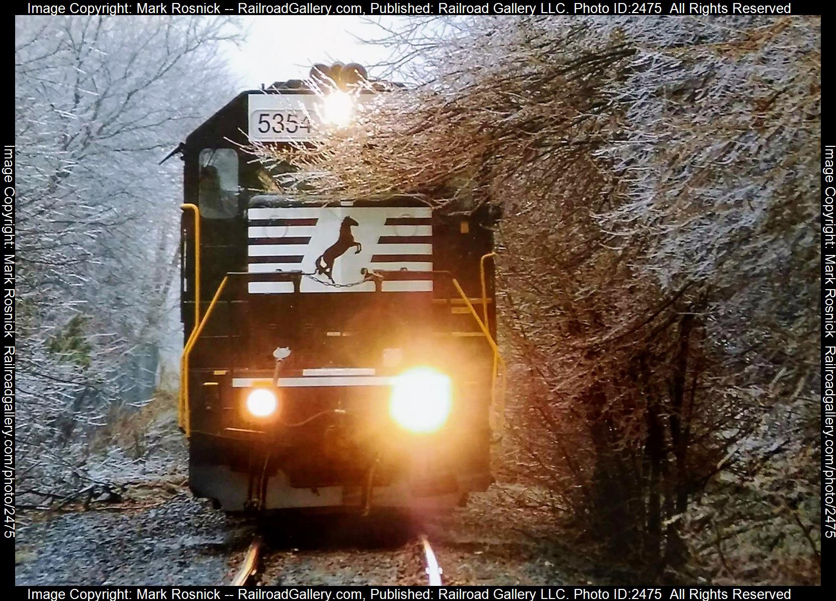 NS 5354 is a class EMD GP38-2 and  is pictured in Mechanicsburg, Pennsylvania, United States.  This was taken along the Carlisle running track on the Norfolk Southern . Photo Copyright: Mark Rosnick uploaded to Railroad Gallery on 11/19/2023. This photograph of NS 5354 was taken on Thursday, January 10, 2008. All Rights Reserved. 