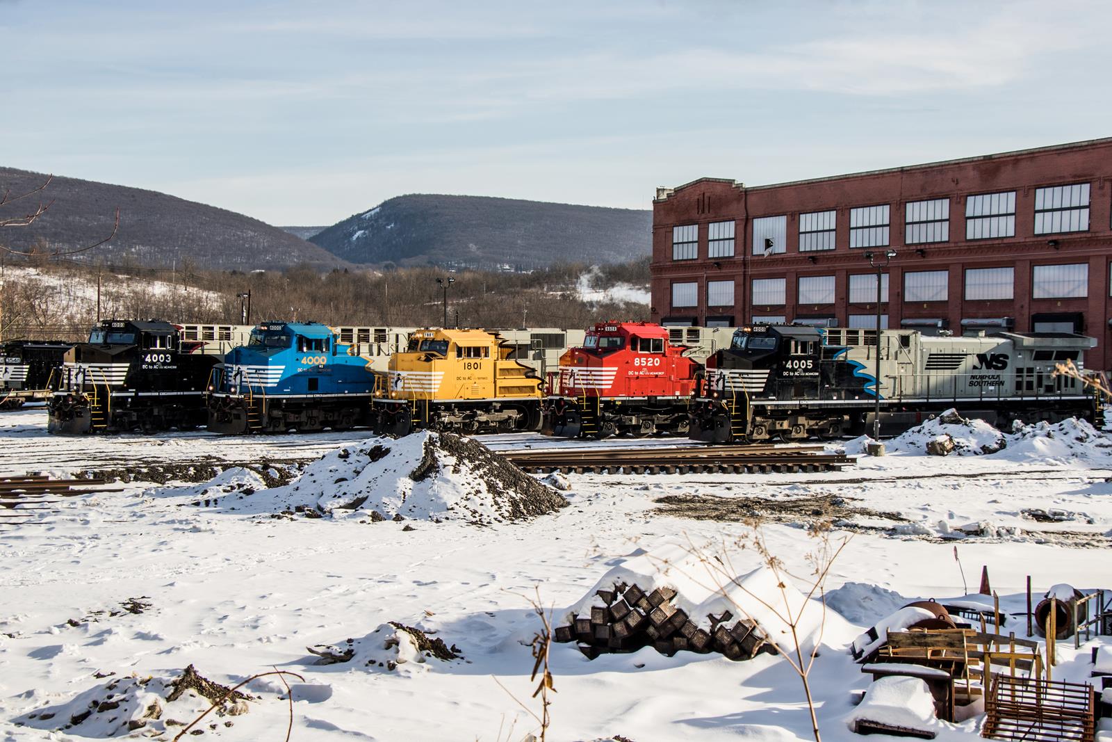 NS 1800, NS 8520, NS 4000, NS 4003, NS 4005 is a class GE AC44C6M, GE AC44C6CF, EMD SD70ACC and  is pictured in Altoona, Pennsylvania, USA.  This was taken along the NS Pittsburgh Line on the Norfolk Southern. Photo Copyright: Marc Lingenfelter uploaded to Railroad Gallery on 11/26/2022. This photograph of NS 1800, NS 8520, NS 4000, NS 4003, NS 4005 was taken on Saturday, February 02, 2019. All Rights Reserved. 