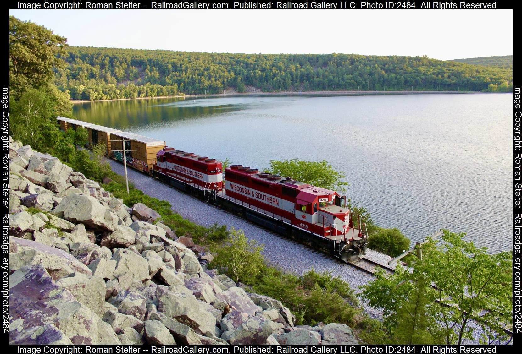 WAMX 4219 is a class SD40-2 and  is pictured in Baraboo, Wisconsin, United States.  This was taken along the Reedsburg Subdivision on the Wisconsin and Southern Railroad. Photo Copyright: Roman Stelter uploaded to Railroad Gallery on 11/21/2023. This photograph of WAMX 4219 was taken on Thursday, July 20, 2023. All Rights Reserved. 