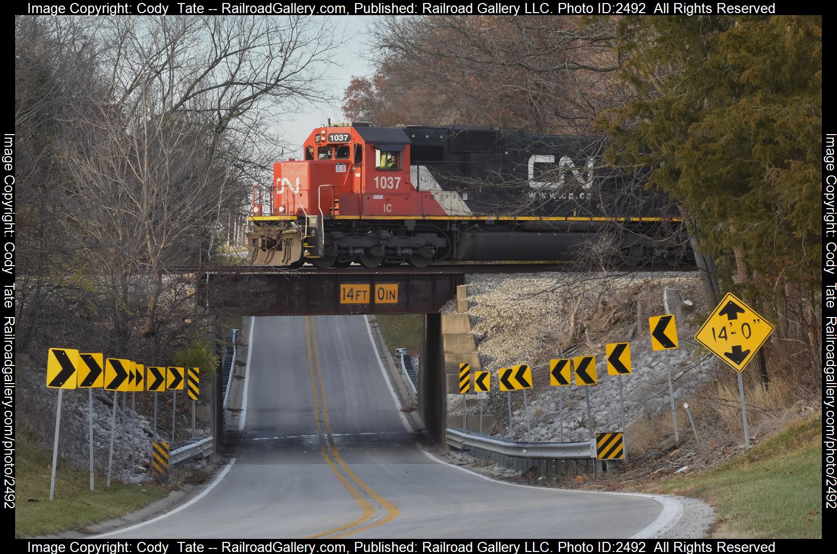 IC 1037 is a class SD70 and  is pictured in Centralia , Illinois, United States.  This was taken along the Centralia subdivision  on the Canadian National Railway. Photo Copyright: Cody  Tate uploaded to Railroad Gallery on 11/25/2023. This photograph of IC 1037 was taken on Saturday, November 25, 2023. All Rights Reserved. 