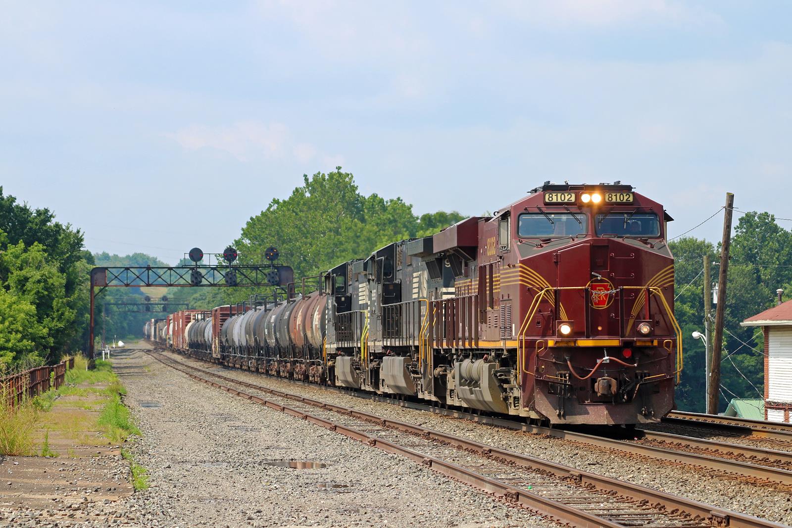 NS 8102 is a class GE ES44AC and  is pictured in Latrobe, Pennsylvania, USA.  This was taken along the Pittsburgh Line on the Norfolk Southern. Photo Copyright: Adam Klimchock uploaded to Railroad Gallery on 11/11/2022. This photograph of NS 8102 was taken on Monday, July 25, 2016. All Rights Reserved. 