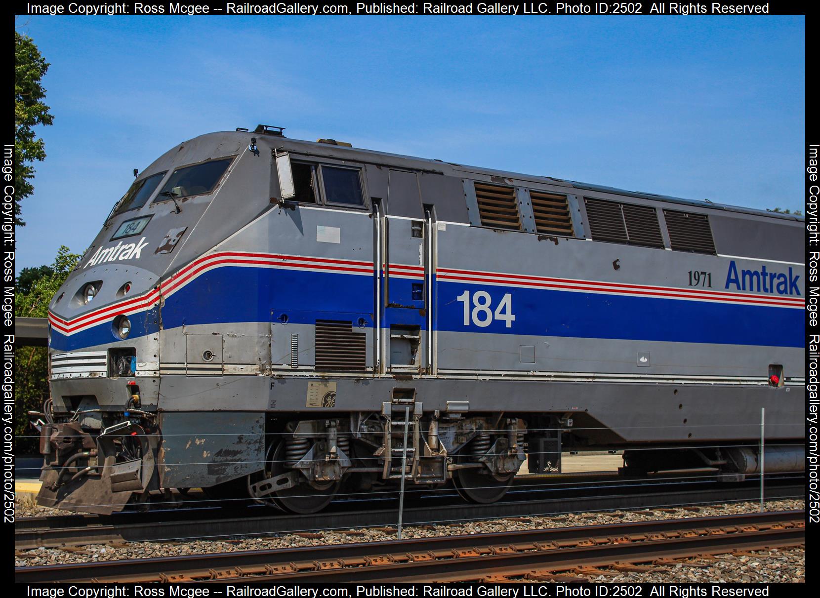 AMTK 184 is a class GE P42DC and  is pictured in Napervillie, Illinois, USA.  This was taken along the BNSF Racetrack on the Amtrak. Photo Copyright: Ross Mcgee uploaded to Railroad Gallery on 11/27/2023. This photograph of AMTK 184 was taken on Saturday, July 23, 2022. All Rights Reserved. 