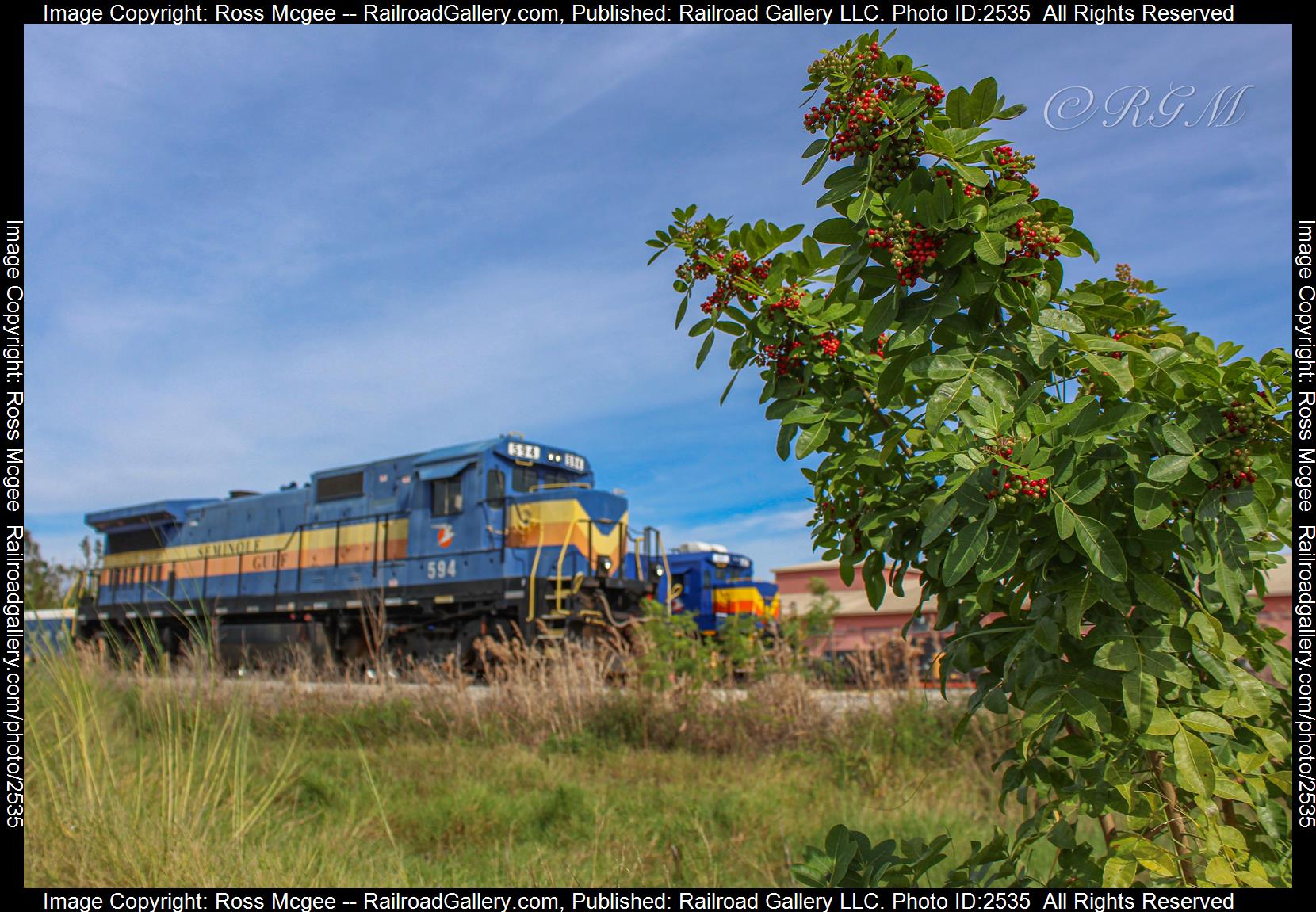 SGLR 597 is a class GE B40-8 (Dash 8-40B) and  is pictured in Fort Myers, Florida, USA.  This was taken along the N/A on the Seminole Gulf Railway. Photo Copyright: Ross Mcgee uploaded to Railroad Gallery on 11/30/2023. This photograph of SGLR 597 was taken on Sunday, November 26, 2023. All Rights Reserved. 