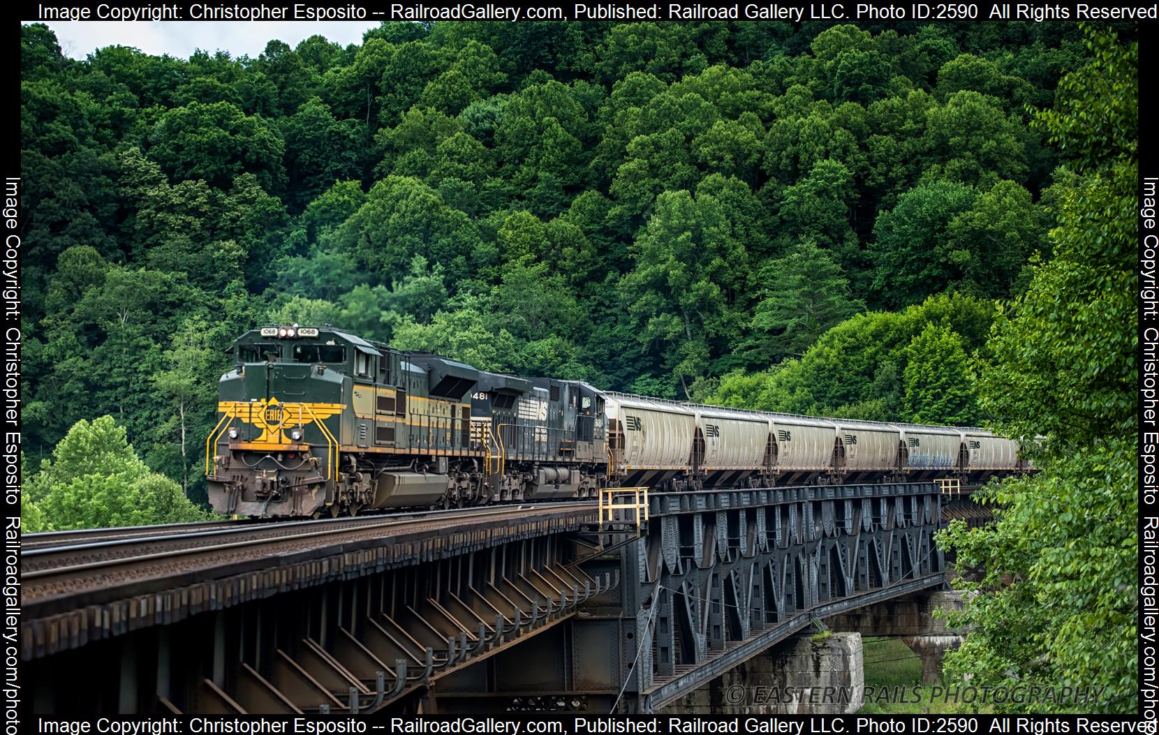 NS 1068 is a class SD70ACe and  is pictured in Coopers, WV, United States.  This was taken along the Pocahontas District  on the Norfolk Southern. Photo Copyright: Christopher Esposito uploaded to Railroad Gallery on 12/05/2023. This photograph of NS 1068 was taken on Saturday, August 07, 2021. All Rights Reserved. 