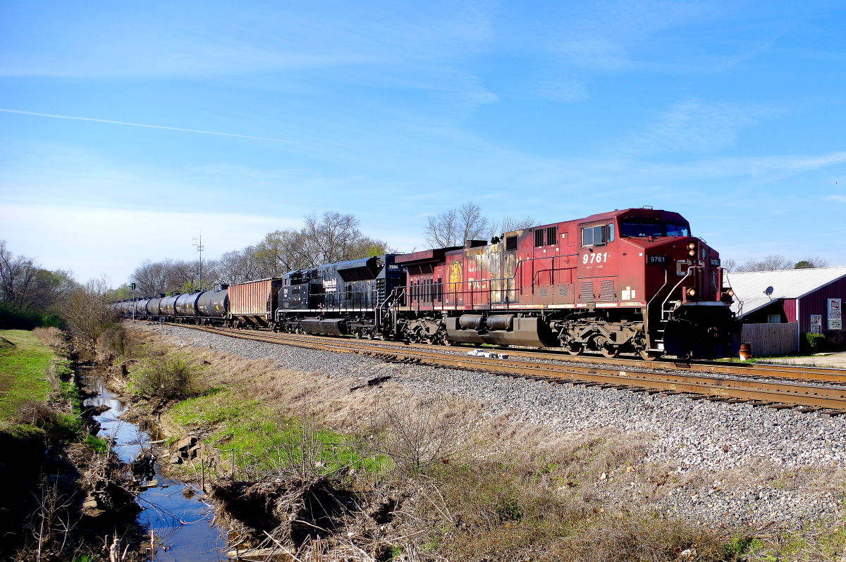 CP 9761 is a class GE ET44AC and  is pictured in Heavener, Oklahoma, USA.  This was taken along the Shreveport/KCS on the Canadian Pacific Railway. Photo Copyright: Rick Doughty uploaded to Railroad Gallery on 12/07/2023. This photograph of CP 9761 was taken on Saturday, March 07, 2020. All Rights Reserved. 