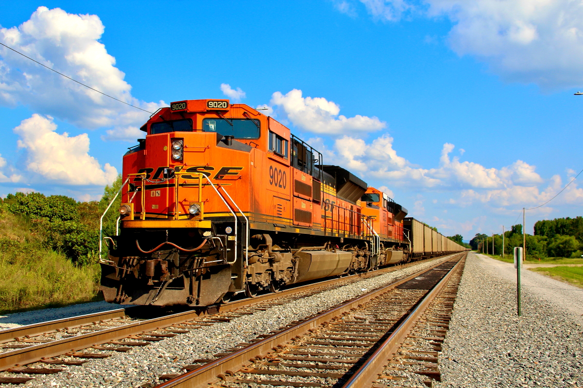 BNSF 9020 is a class EMD SD70ACe and  is pictured in Heavener, Oklahoma, USA.  This was taken along the Heavener/KCS on the BNSF Railway. Photo Copyright: Rick Doughty uploaded to Railroad Gallery on 12/09/2023. This photograph of BNSF 9020 was taken on Saturday, August 22, 2020. All Rights Reserved. 