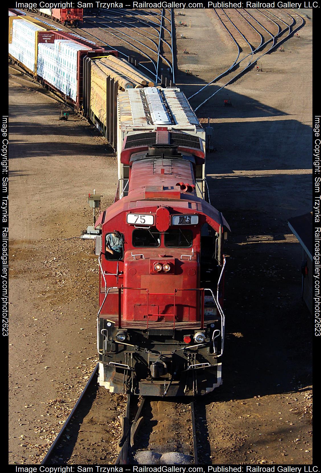 MNNR 75 is a class GE B36-7 and  is pictured in St. Paul, Minnesota, USA.  This was taken along the MNNR Midway Yard on the Minnesota Commercial Railway. Photo Copyright: Sam Trzynka uploaded to Railroad Gallery on 12/10/2023. This photograph of MNNR 75 was taken on Saturday, October 29, 2022. All Rights Reserved. 