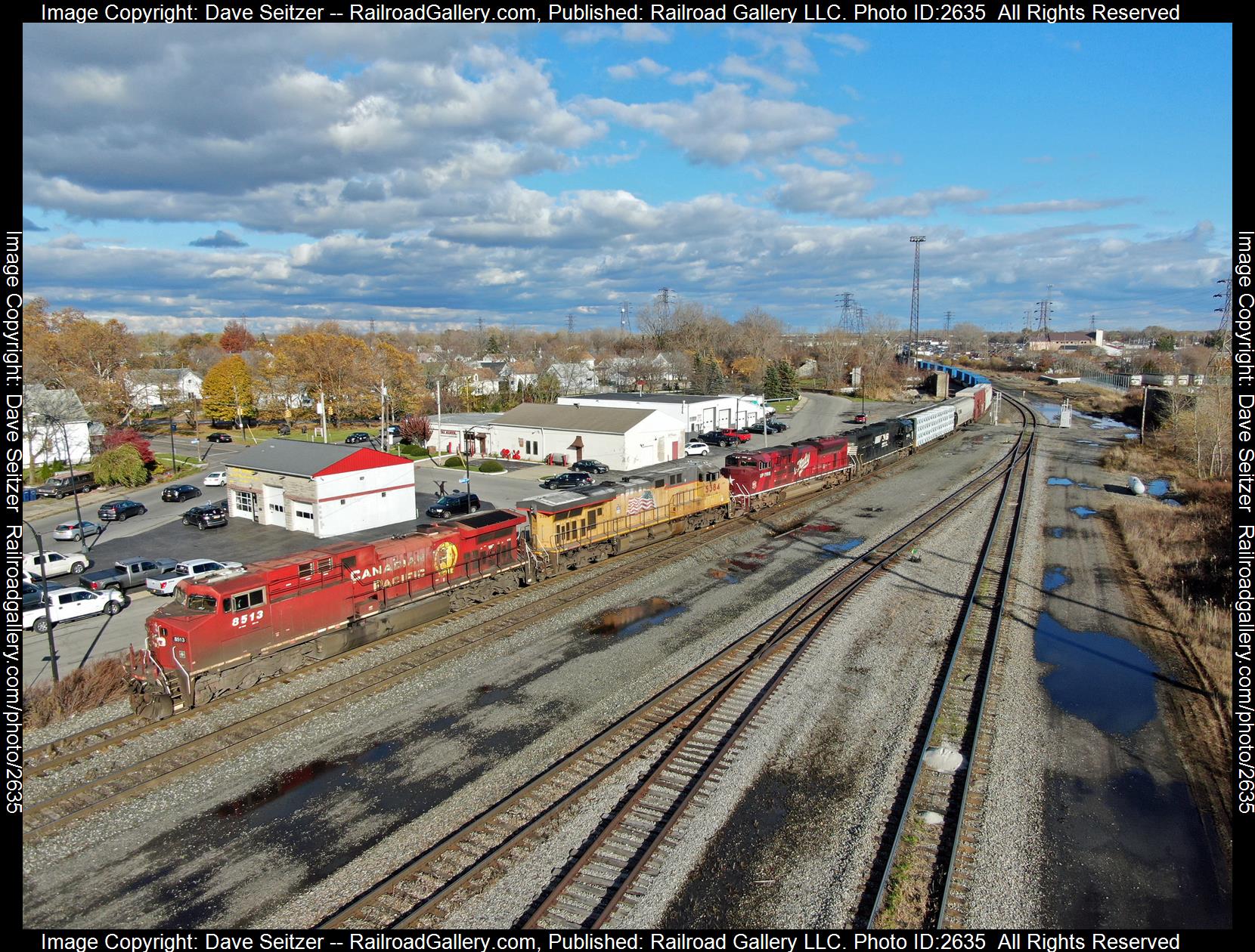 CP 8513 UP 5384 UP 1988 NS 6954 is a class AC4400CW ES44AC SD70ACe SD60E and  is pictured in Sloan, New York, United States.  This was taken along the Southern Tier on the Norfolk Southern. Photo Copyright: Dave Seitzer uploaded to Railroad Gallery on 12/11/2023. This photograph of CP 8513 UP 5384 UP 1988 NS 6954 was taken on Tuesday, November 16, 2021. All Rights Reserved. 