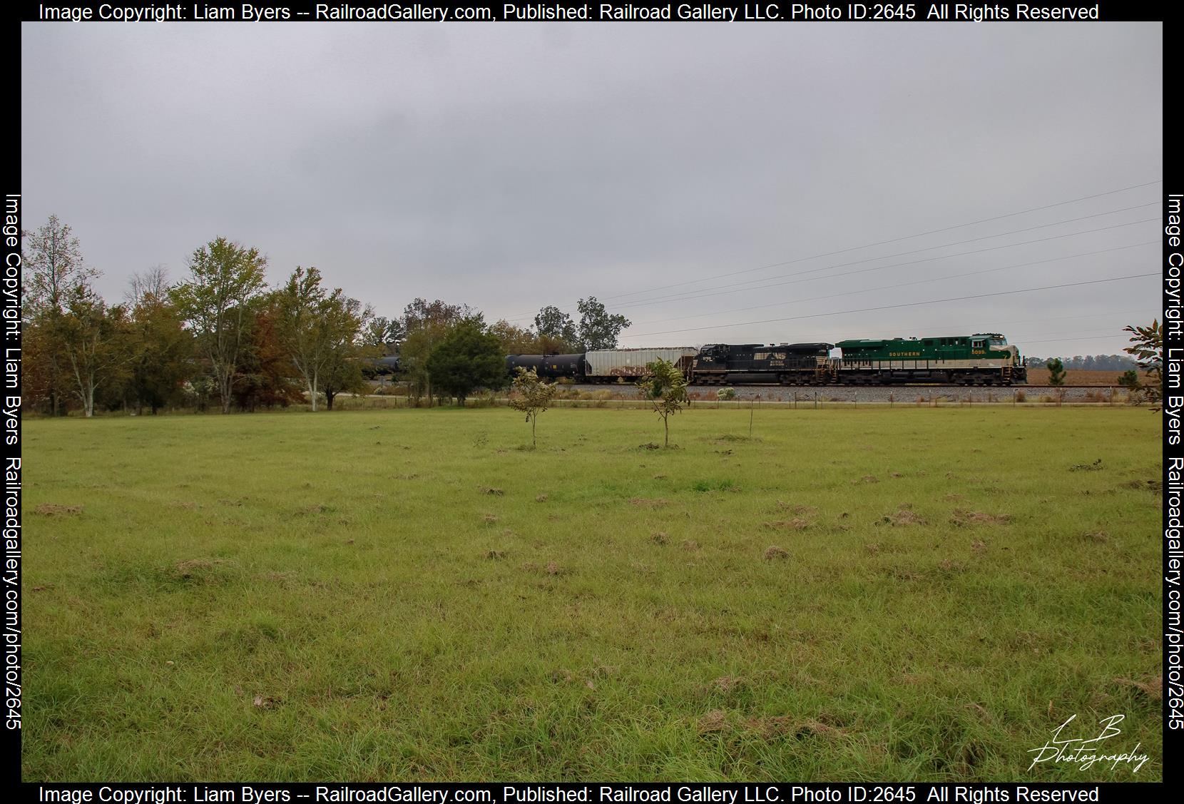 NS 8099 is a class GE ES44AC and  is pictured in Sycamore, GA, Georgia, USA.  This was taken along the NS GS&F on the Norfolk Southern. Photo Copyright: Liam Byers uploaded to Railroad Gallery on 12/12/2023. This photograph of NS 8099 was taken on Saturday, November 11, 2023. All Rights Reserved. 