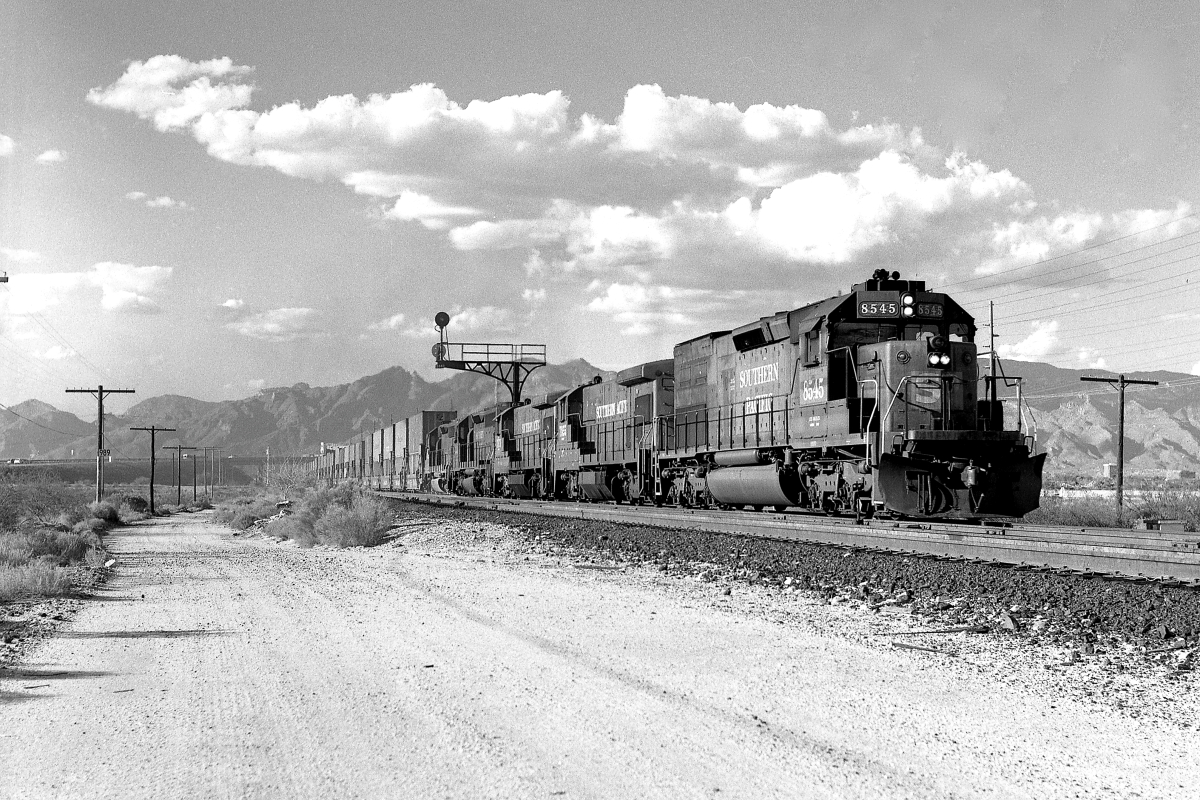 SP 8545 is a class EMD SD40T-2 and  is pictured in Tucson, Arizona, USA.  This was taken along the Lordsburg/SP on the Southern Pacific Transportation Company. Photo Copyright: Rick Doughty uploaded to Railroad Gallery on 12/13/2023. This photograph of SP 8545 was taken on Saturday, August 15, 1987. All Rights Reserved. 