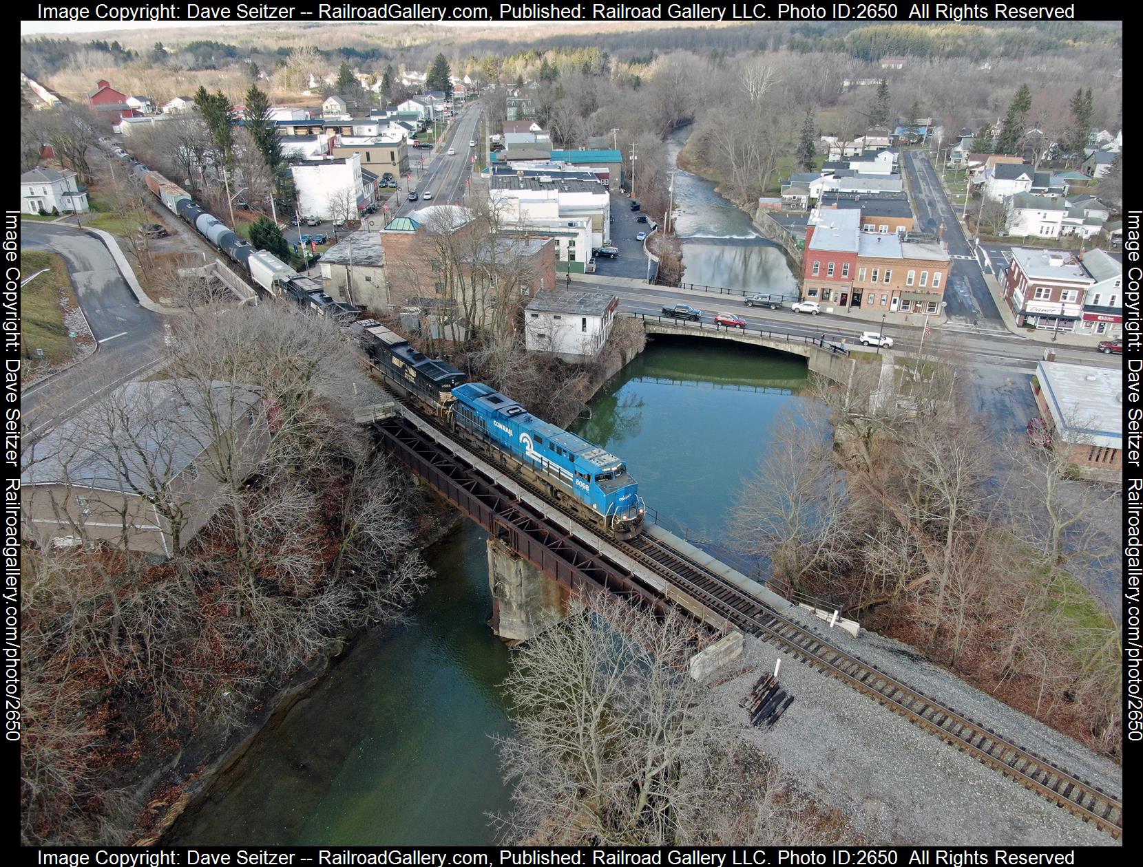 NS 8098 NS 9555 NS 4307 is a class ES44AC C44-9W AC44C6M and  is pictured in Attica, New York, United States.  This was taken along the Southern Tier on the Norfolk Southern. Photo Copyright: Dave Seitzer uploaded to Railroad Gallery on 12/13/2023. This photograph of NS 8098 NS 9555 NS 4307 was taken on Friday, December 31, 2021. All Rights Reserved. 