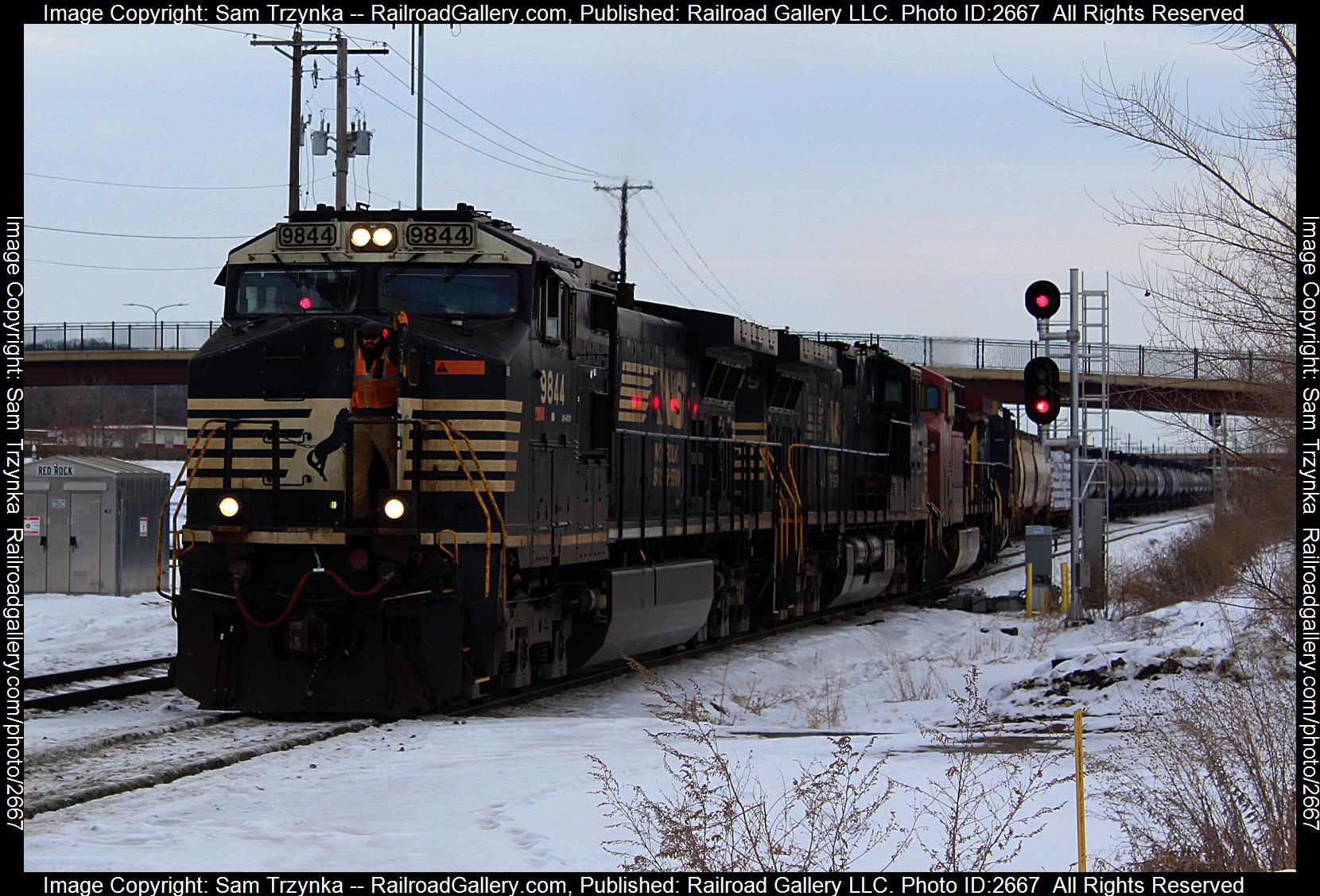 NS 9844 is a class GE C44-9W (Dash 9-44CW) and  is pictured in Newport, Minnesota, USA.  This was taken along the BNSF St. Paul Subdivision on the Canadian Pacific Railway. Photo Copyright: Sam Trzynka uploaded to Railroad Gallery on 12/14/2023. This photograph of NS 9844 was taken on Wednesday, December 28, 2022. All Rights Reserved. 