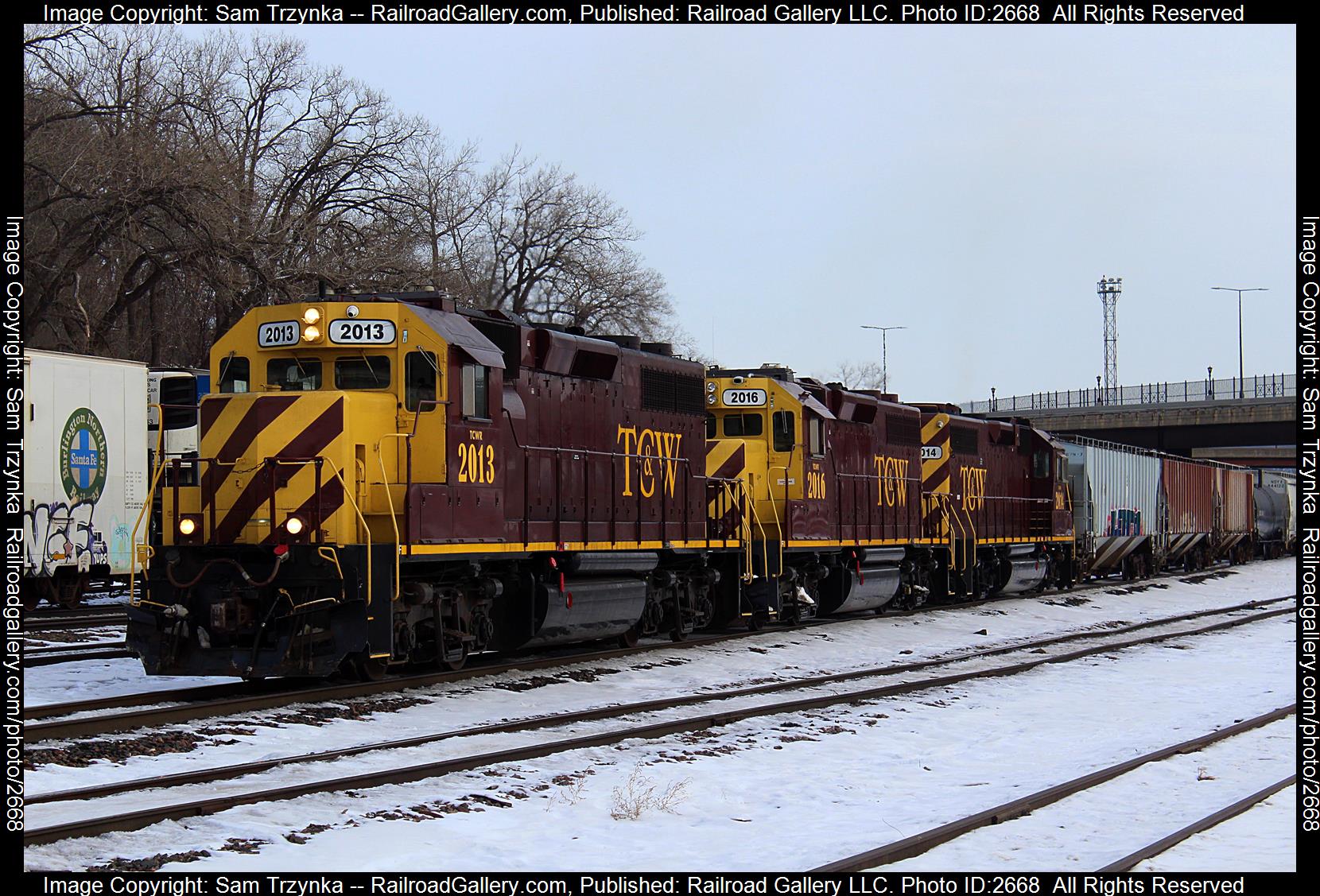 TCWR 2013 is a class EMD GP38-2 and  is pictured in St. Paul, Minnesota, USA.  This was taken along the BNSF St. Paul Subdivision on the Twin Cities and Western Railroad. Photo Copyright: Sam Trzynka uploaded to Railroad Gallery on 12/14/2023. This photograph of TCWR 2013 was taken on Saturday, December 31, 2022. All Rights Reserved. 