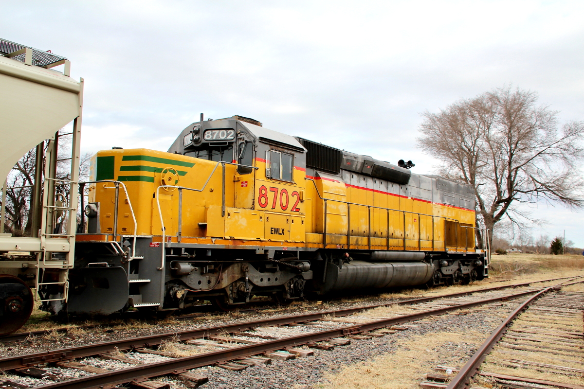 EWLX 8702 is a class EMD SD40T-2 and  is pictured in South Haven, Kansas, USA.  This was taken along the Eastern Washington. Photo Copyright: Rick Doughty uploaded to Railroad Gallery on 12/15/2023. This photograph of EWLX 8702 was taken on Thursday, March 11, 2021. All Rights Reserved. 