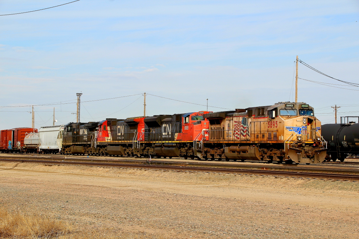 UP 5895 is a class GE AC4400CW-CTE and  is pictured in North Platte, Nebraska, USA.  This was taken along the North Platte/UP on the Union Pacific Railroad. Photo Copyright: Rick Doughty uploaded to Railroad Gallery on 12/15/2023. This photograph of UP 5895 was taken on Friday, March 12, 2021. All Rights Reserved. 