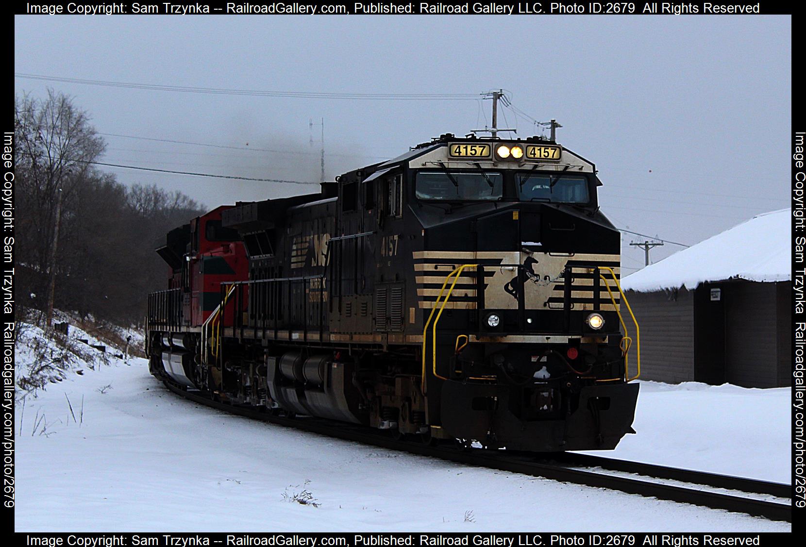 NS 4157 is a class GE AC44C6M and  is pictured in Prescott, Wisconsin, USA.  This was taken along the BNSF St. Croix Subdivision on the BNSF Railway. Photo Copyright: Sam Trzynka uploaded to Railroad Gallery on 12/15/2023. This photograph of NS 4157 was taken on Sunday, January 22, 2023. All Rights Reserved. 