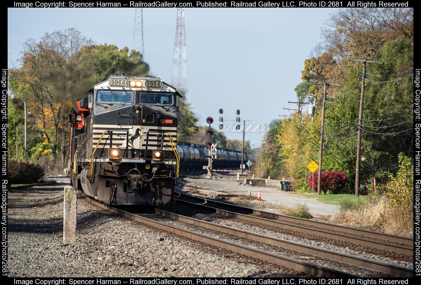 NS 9864 is a class GE C44-9W (Dash 9-44CW) and  is pictured in South Bend, Indiana, USA.  This was taken along the Chicago Line on the Norfolk Southern. Photo Copyright: Spencer Harman uploaded to Railroad Gallery on 12/15/2023. This photograph of NS 9864 was taken on Sunday, November 05, 2023. All Rights Reserved. 