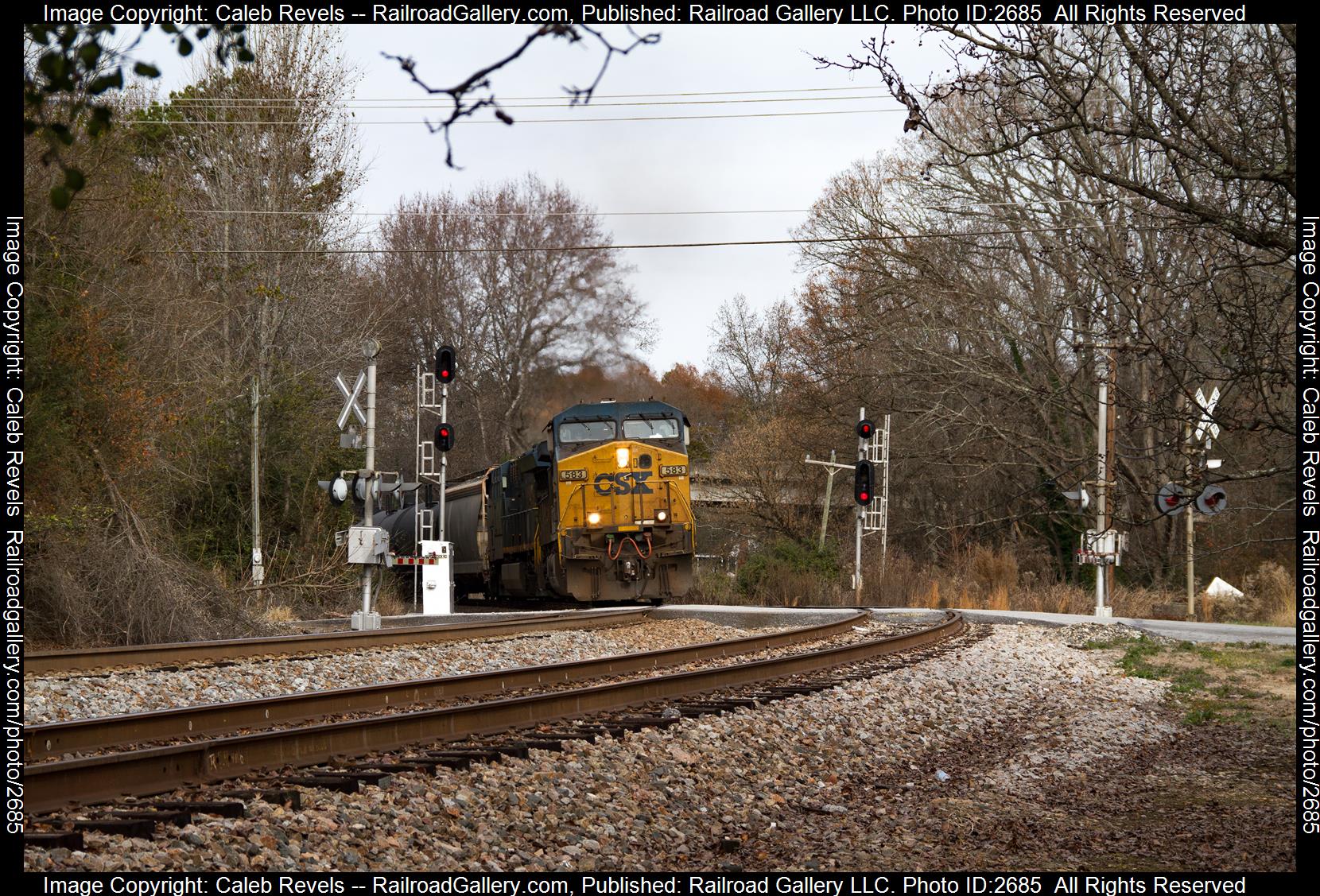 CSXT 593 is a class GE AC4400CW and  is pictured in Roebuck , South Carolina, USA.  This was taken along the CSX Spartanburg Subdivision  on the CSX Transportation. Photo Copyright: Caleb Revels uploaded to Railroad Gallery on 12/16/2023. This photograph of CSXT 593 was taken on Saturday, December 16, 2023. All Rights Reserved. 