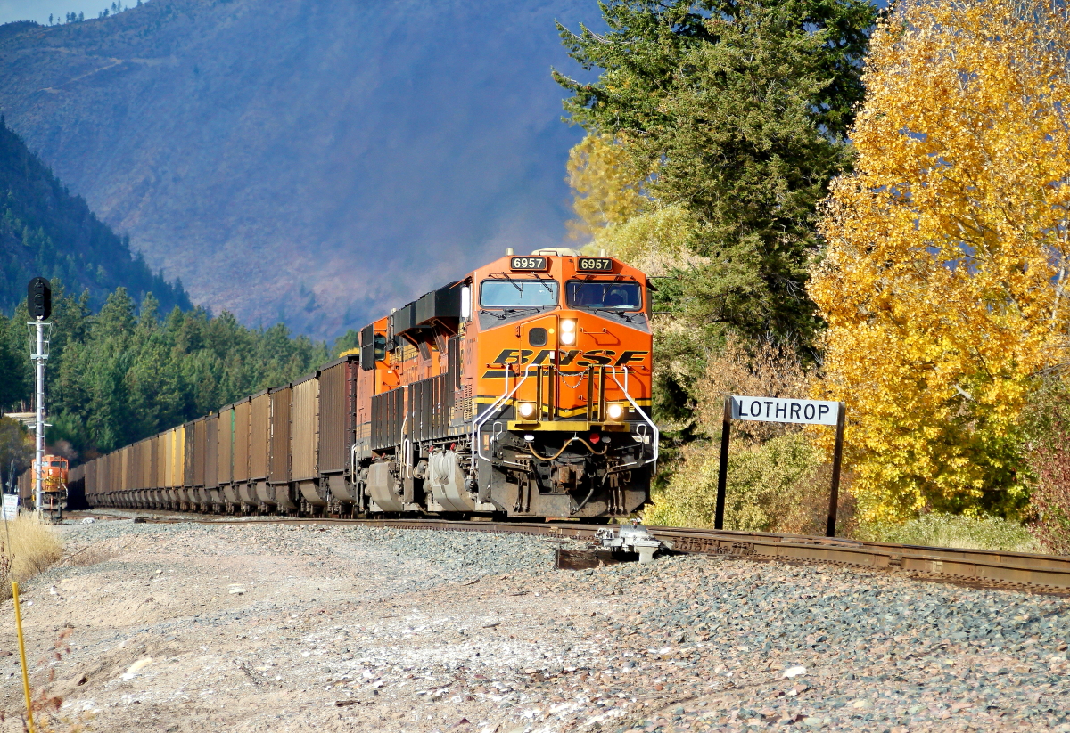 BNSF 6957 is a class GE ES44AC and  is pictured in Lothrop, Montana, USA.  This was taken along the 4th Sub/MRL on the BNSF Railway. Photo Copyright: Rick Doughty uploaded to Railroad Gallery on 12/16/2023. This photograph of BNSF 6957 was taken on Wednesday, October 20, 2021. All Rights Reserved. 