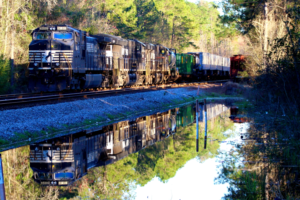 NS 9446 is a class GE C44-9W (Dash 9-44CW) and  is pictured in Picketville, Florida, USA.  This was taken along the Norfolk Southern. Photo Copyright: Rick Doughty uploaded to Railroad Gallery on 12/19/2023. This photograph of NS 9446 was taken on Tuesday, February 23, 2021. All Rights Reserved. 